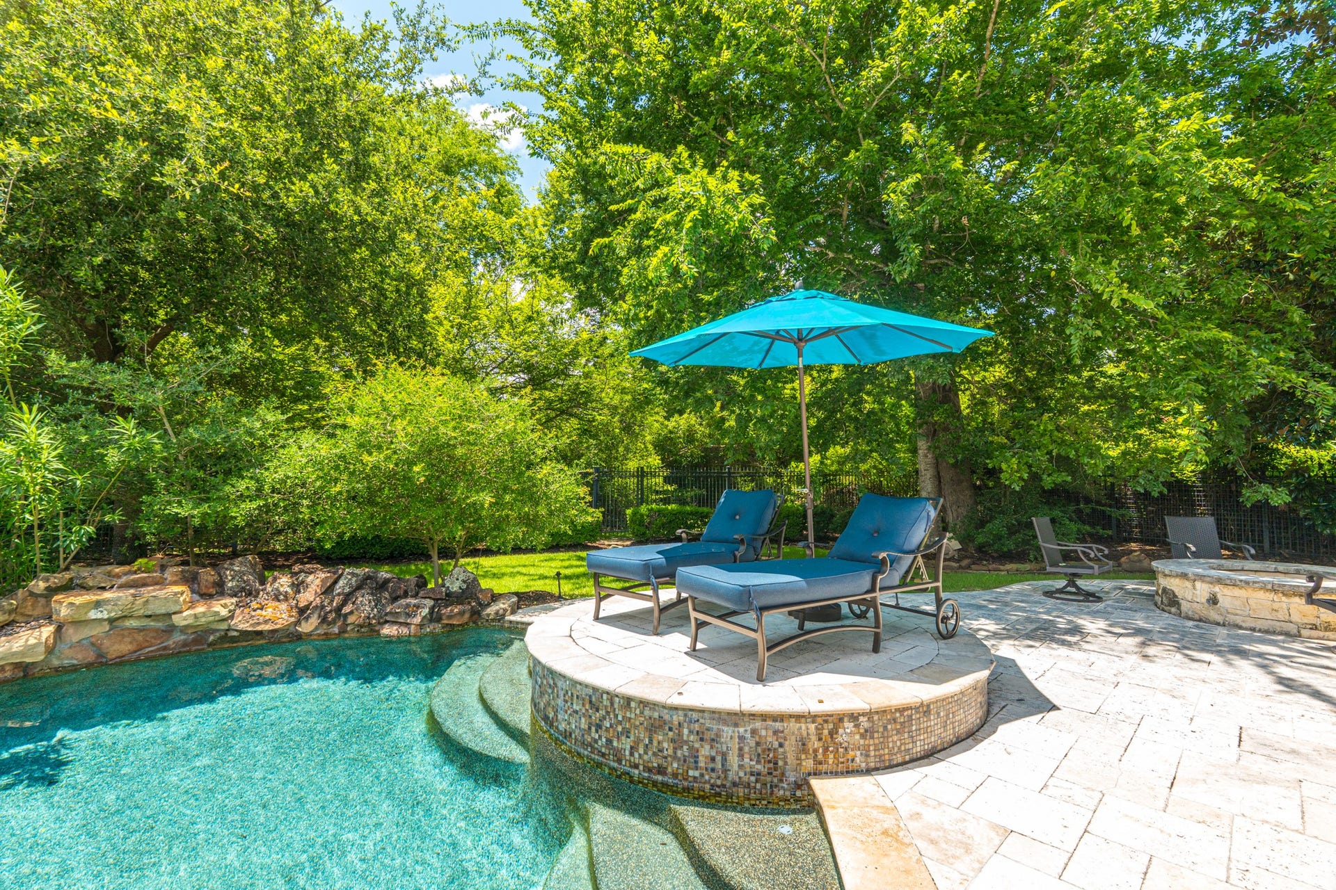 247 S Fazio Way, Spring, TX 77389 Every detail was thoughtfully designed to create an unmatched resort experience. Unwind in your own oasis, complete with a sun shelf, elegant lounge spaces, and thoughtfully designed landscaping creating a true resort atmosphere.
