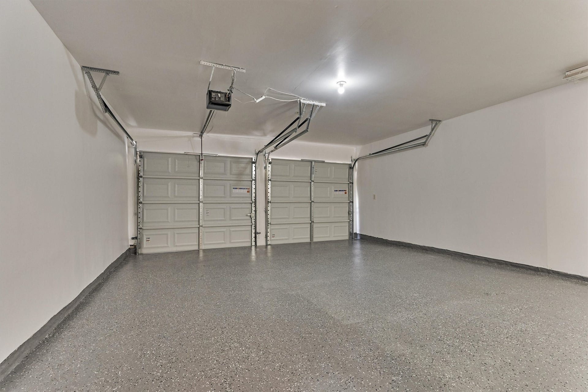 26 W Broken Oak Court, The Woodlands, TX 77381 The garage has been freshly painted and epoxy flooring applied. Brand new garage doors too!