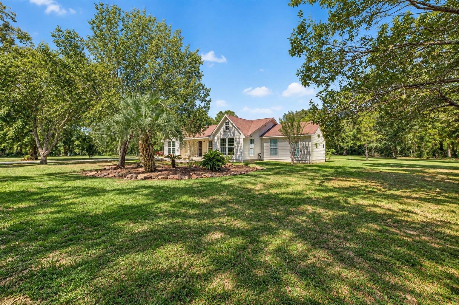 Beautifully situated among mature trees, this home offers a peaceful setting with plenty of open space to enjoy.