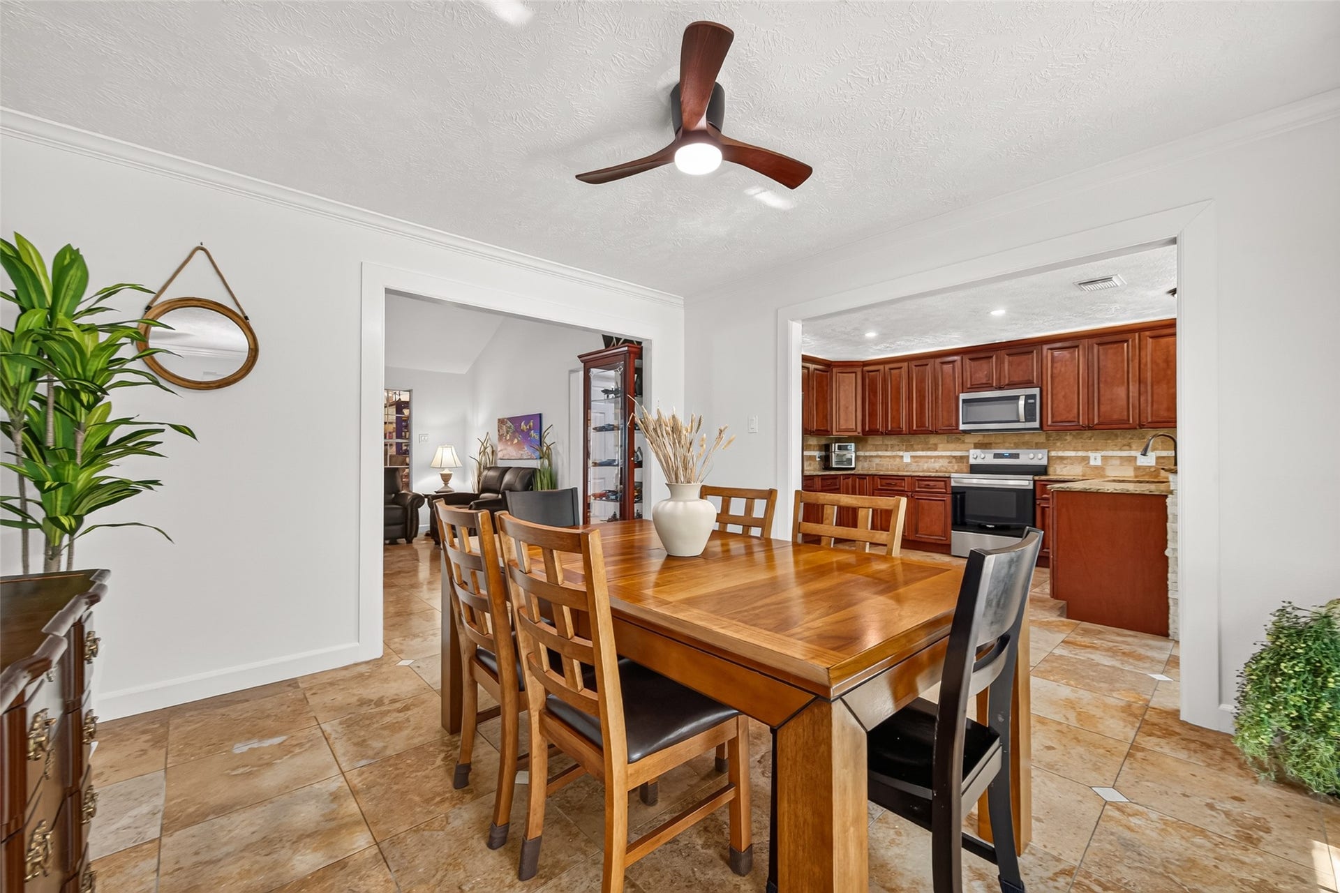 Dining area conveniently positioned between the main living space and kitchen, creating an easy flow throughout the home.