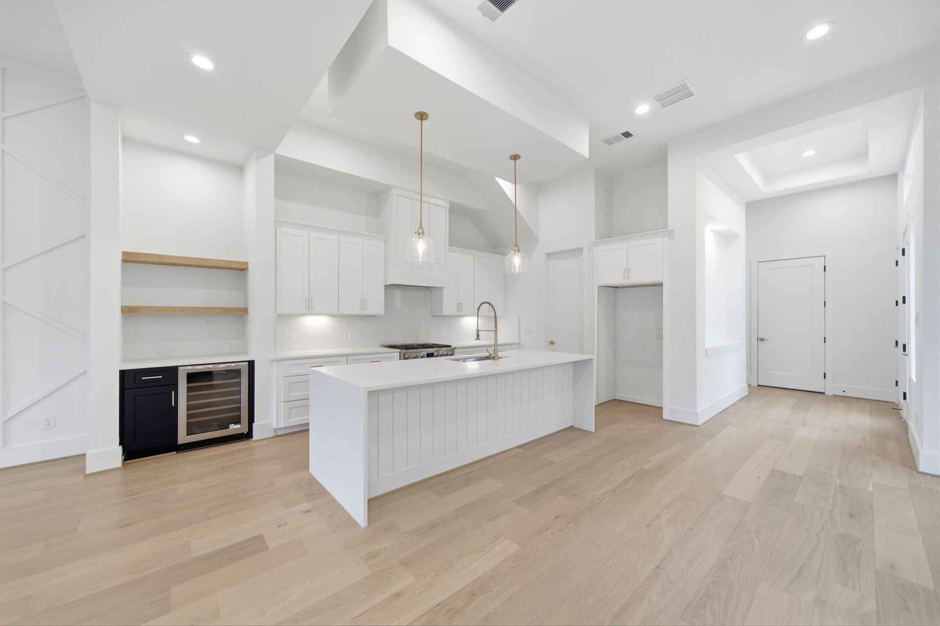 Alternate view if beautifully appointed kitchen and open to the dining area.
