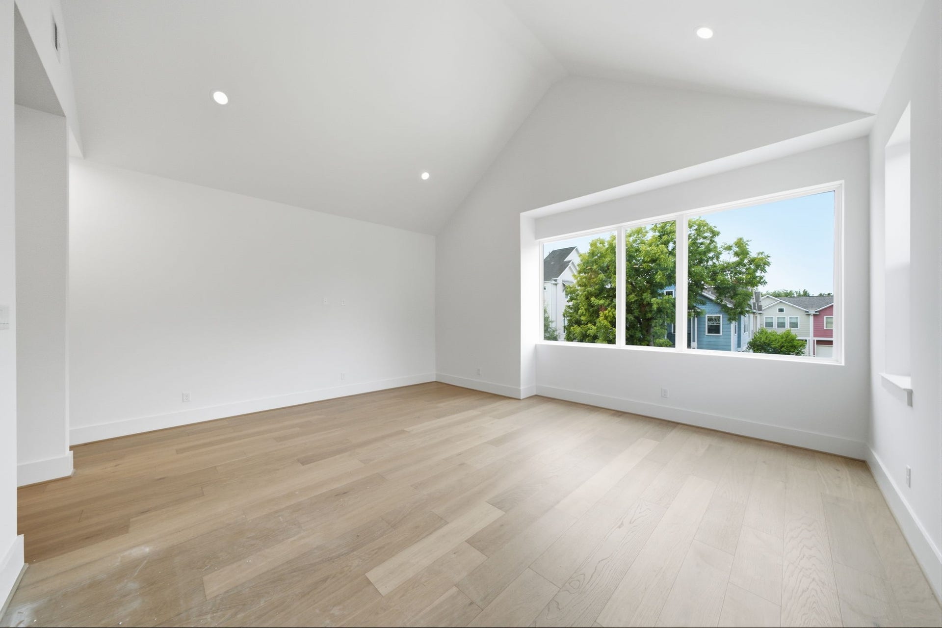Vaulted ceilings with extra large windows complete this perfect retreat
