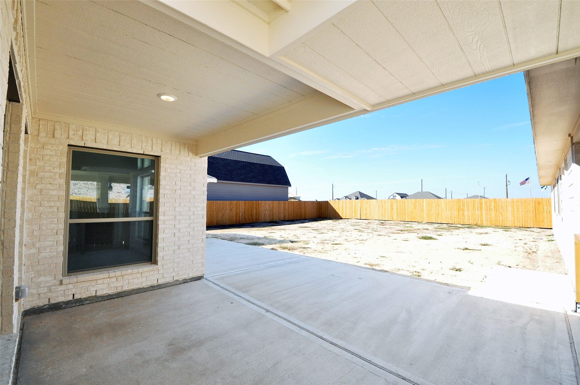 2210 ENSENADA Drive, League City, TX 77539 Covered Patio area off the porte coacher.