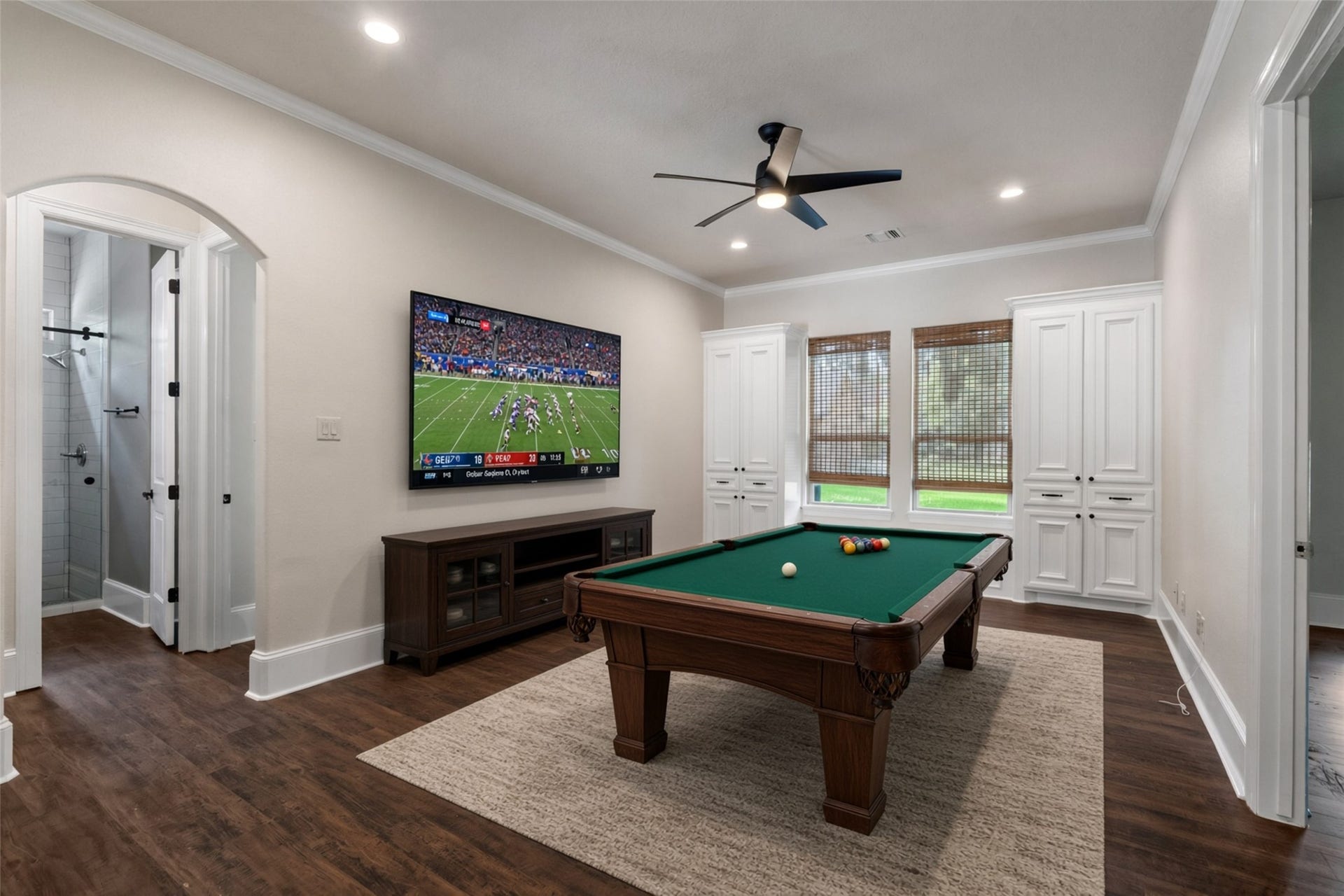 Gameroom downstairs with built-in storage *Vitually Staged*