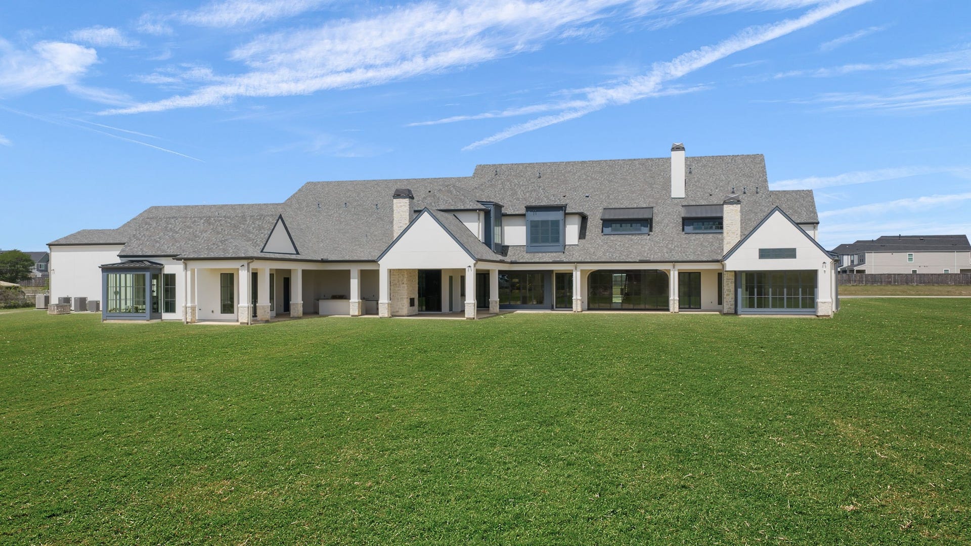 4233 Two Gun Way, Katy, TX 77494 Rear elevation digitally enhanced grass.