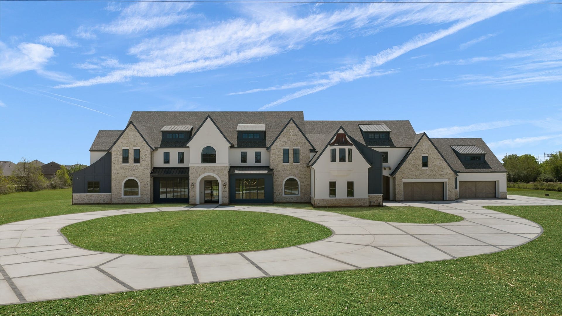 4233 Two Gun Way, Katy, TX 77494 Front elevation with digitally enhanced grass.