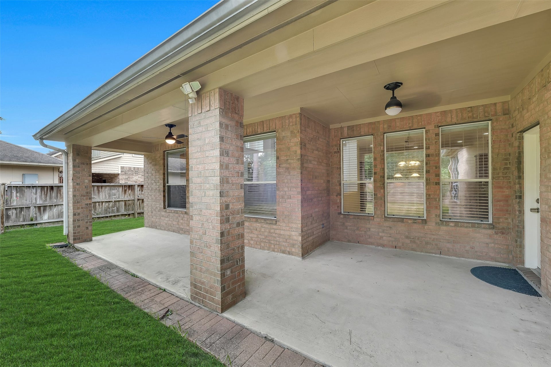 8407 Alyssa Gardens Lane, Humble, TX 77396 If you love outdoor living, this oversized covered rear porch delivers. Perfectly designed for relaxing with family, it also offers seamless potential to add a custom summer kitchen.
