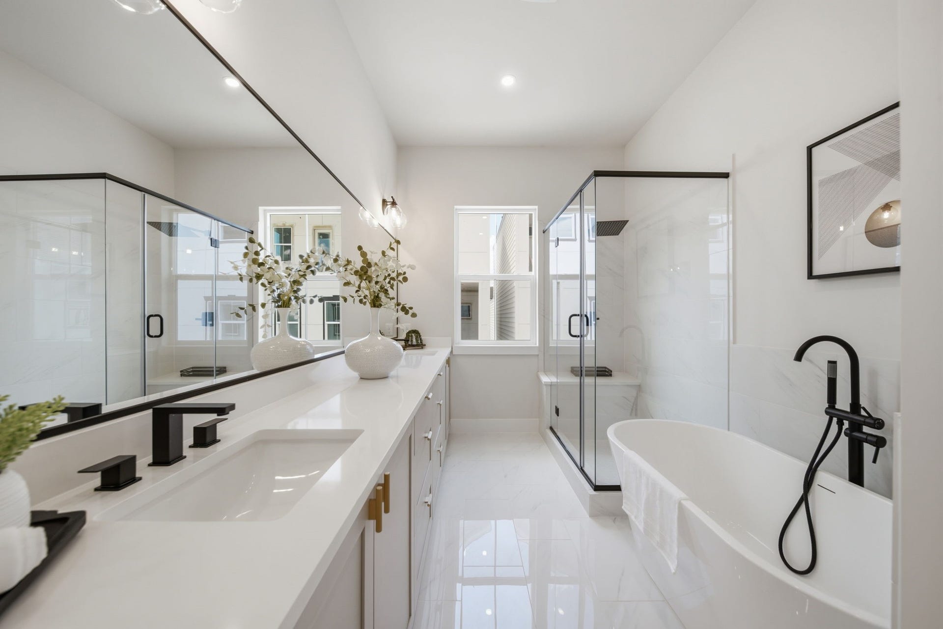 5522 Wheatley Street, #C, Houston, TX 77091 Primary bathroom with stand-alone tub and free-standing shower - located on the second floor.