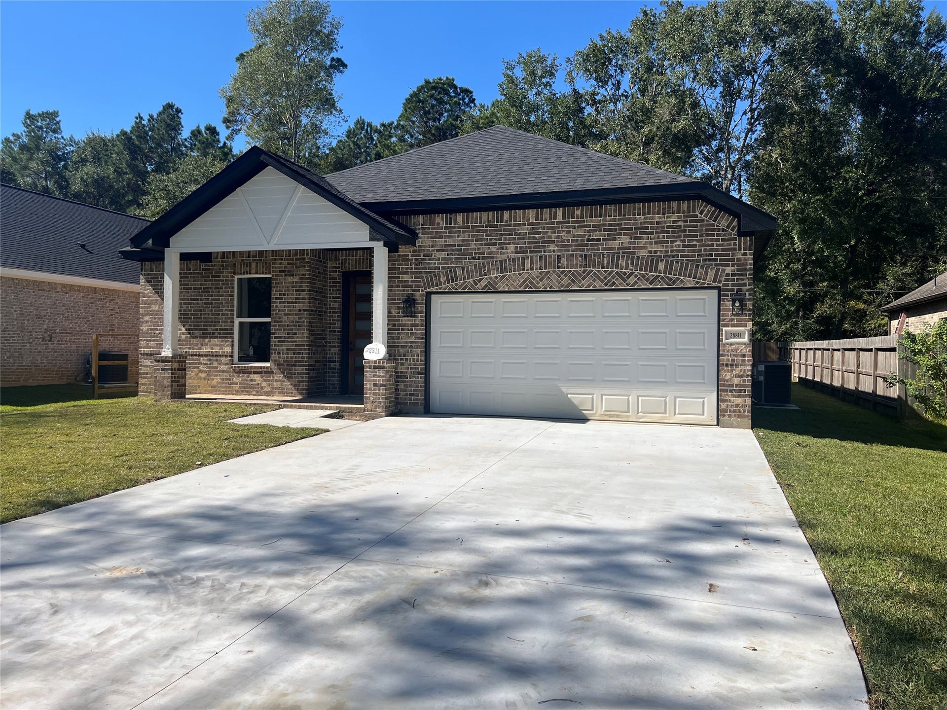 28811 Champion Oaks Dr, Magnolia, TX 77354 28811 Champion Oak front covers porch