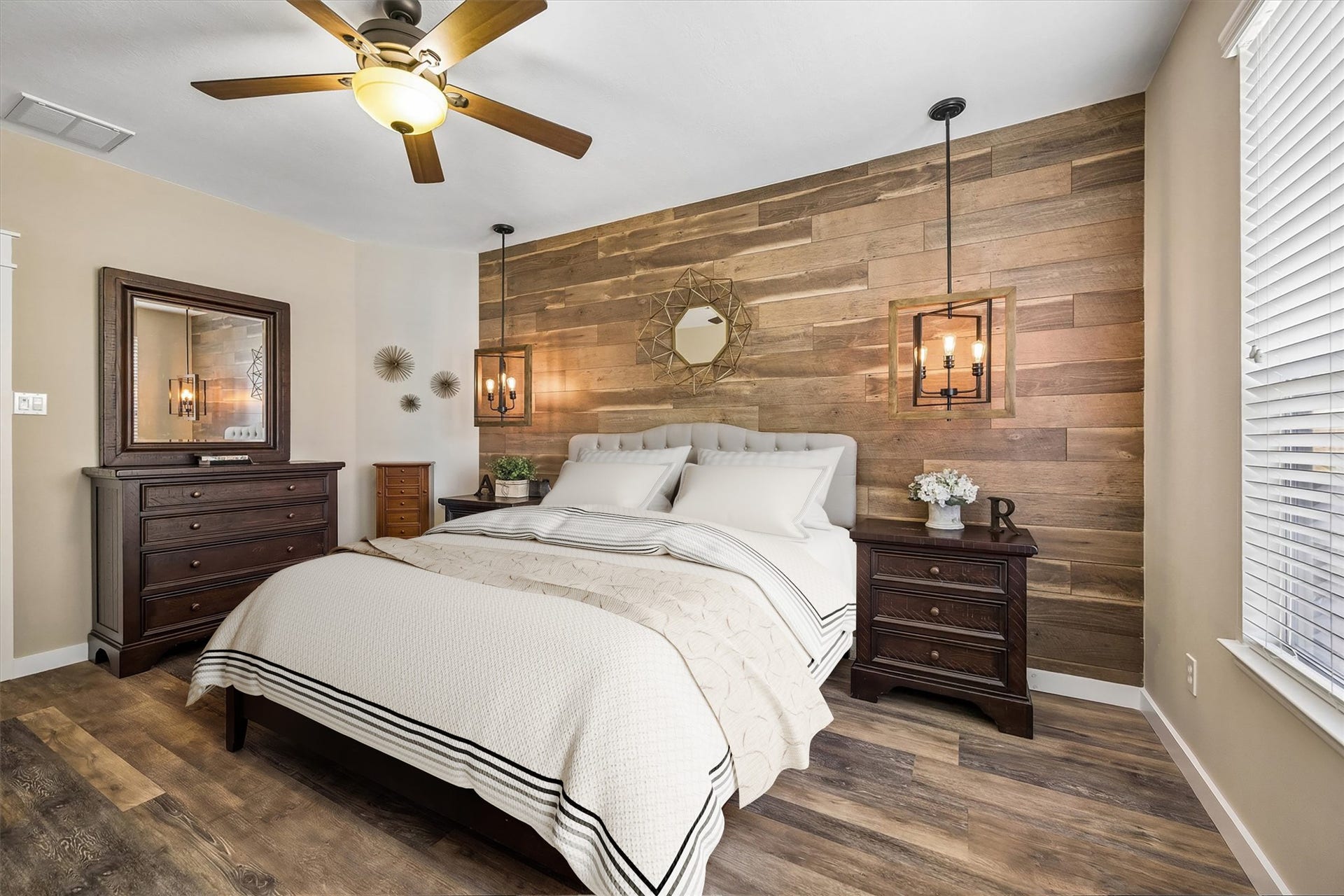 13918 Cypress Creek Bank Drive, Cypress, TX 77429 Another view of the primary bedroom highlights the rich wood detailing, natural light, and comfortable layout. It's a relaxing retreat with plenty of character and room to make your own.