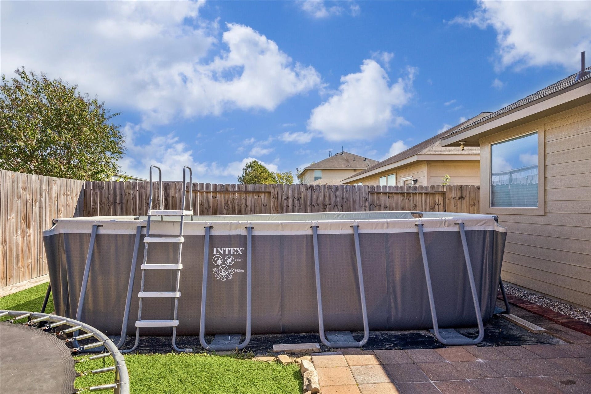 13918 Cypress Creek Bank Drive, Cypress, TX 77429 The backyard features an above-ground pool, perfect for cooling off during those warm Texas summers. A private fenced setting offers space to enjoy sunny afternoons at home.