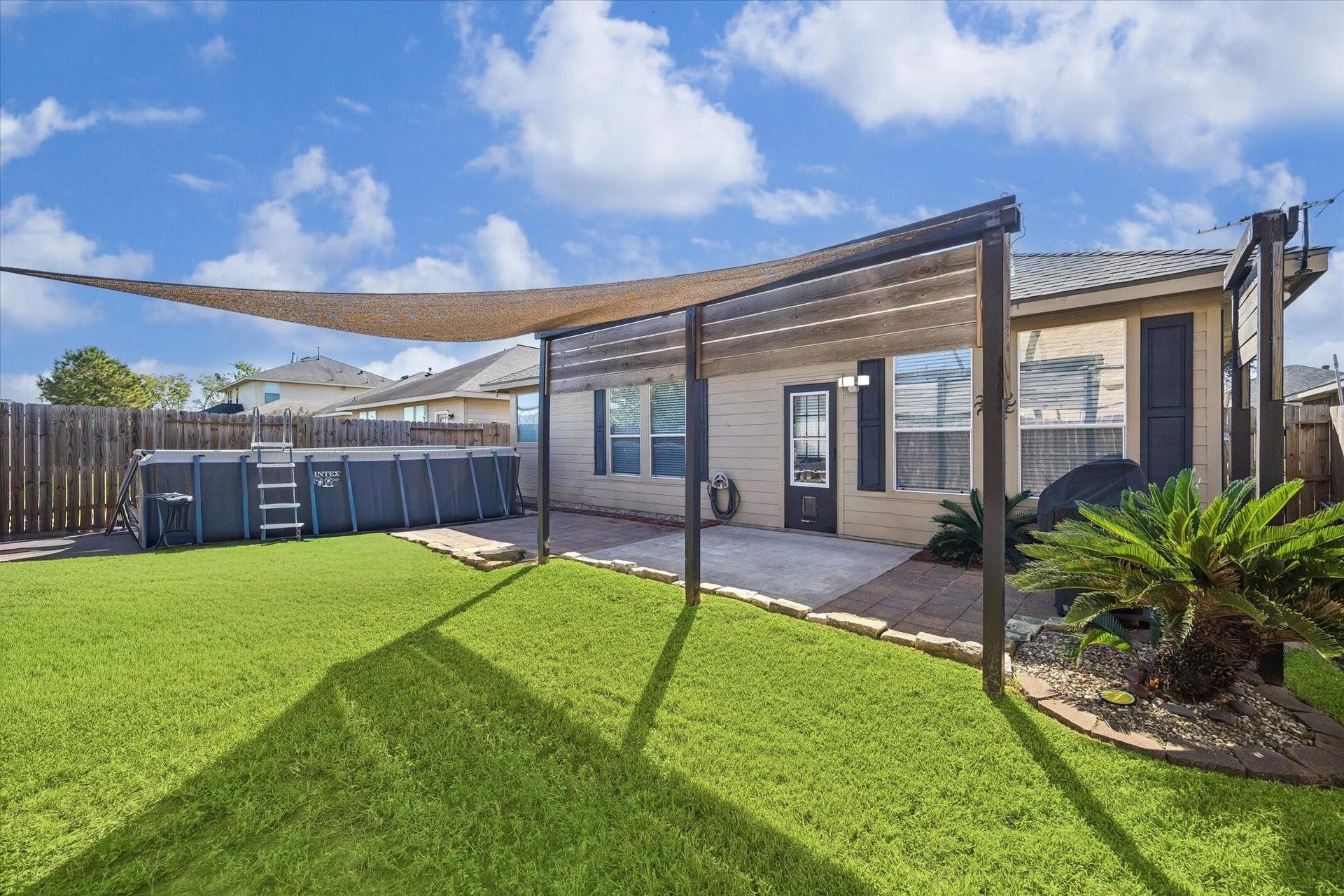 13918 Cypress Creek Bank Drive, Cypress, TX 77429 Enjoy the backyard with a spacious lawn, established landscaping, and a pergola that creates a welcoming spot for outdoor gatherings. There's plenty of room to relax, entertain, or enjoy a little fresh air.