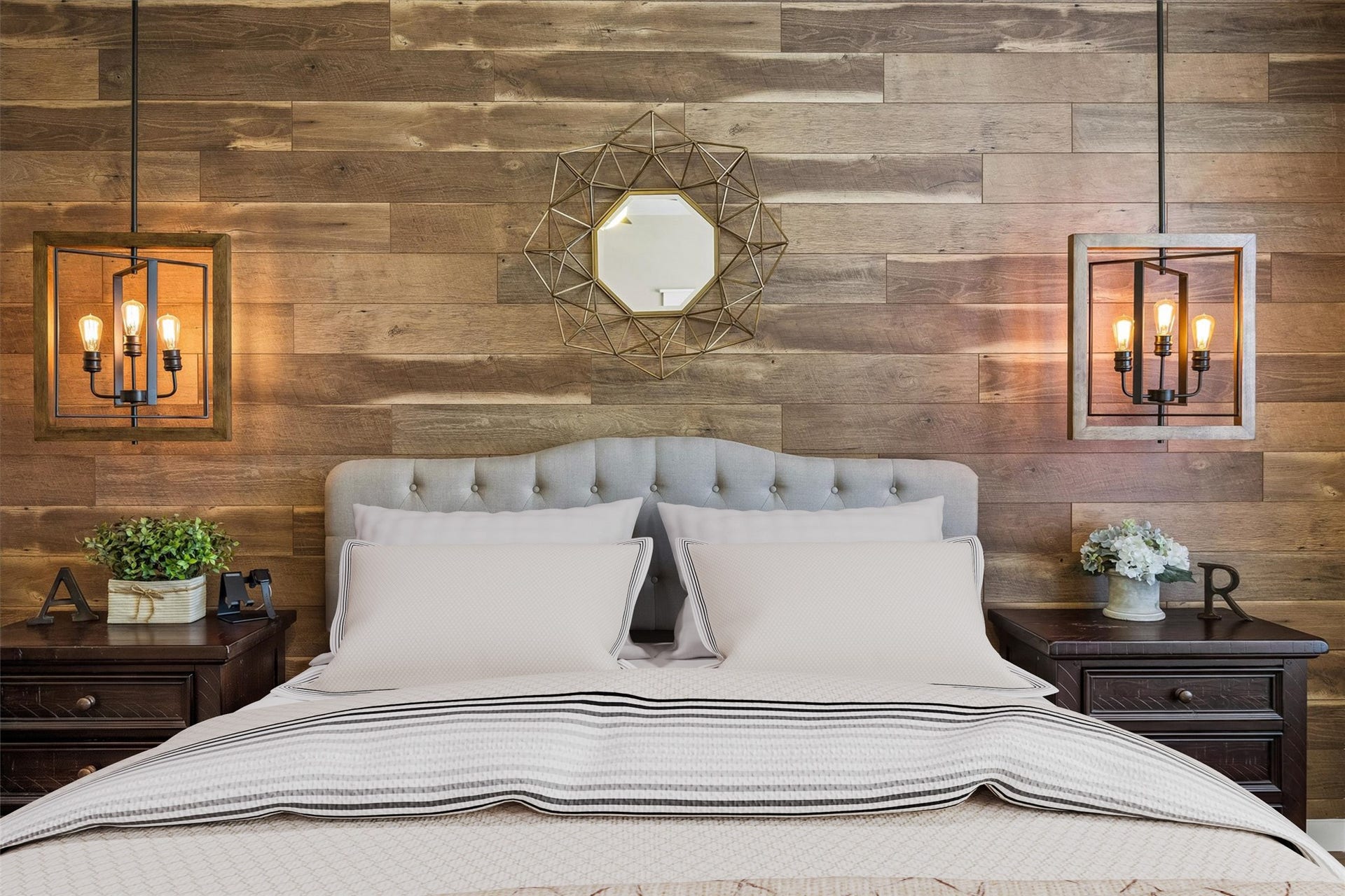 13918 Cypress Creek Bank Drive, Cypress, TX 77429 The primary bedroom's wood accent wall creates a beautiful focal point behind the bed, complemented by pendant lighting on either side. A thoughtful design detail that gives the space a cozy, inviting feel.