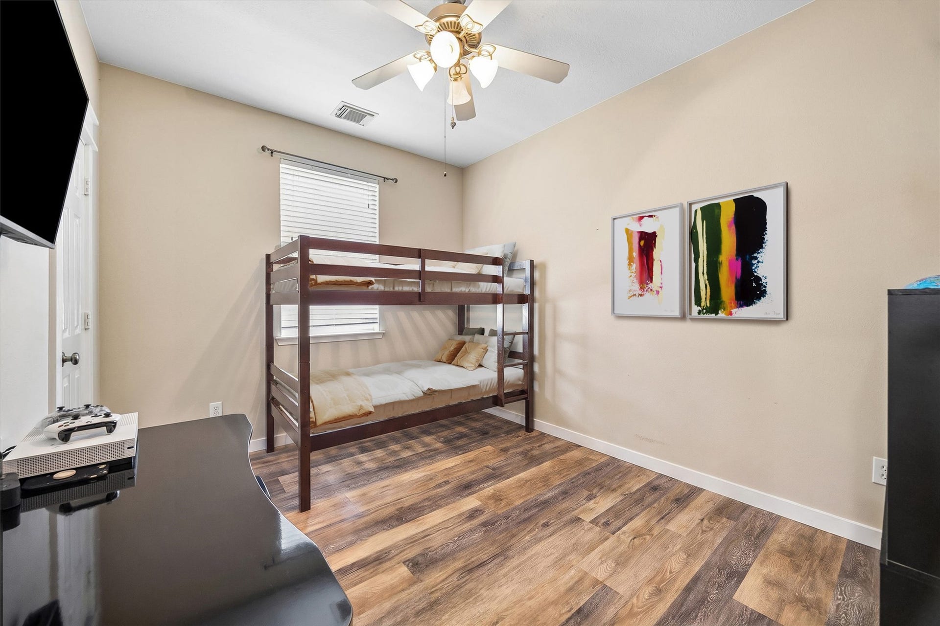 13918 Cypress Creek Bank Drive, Cypress, TX 77429 Another view of the secondary bedroom highlights its flexible layout and natural light. Whether used as a bedroom, playroom, or creative space, there's room to make it your own.