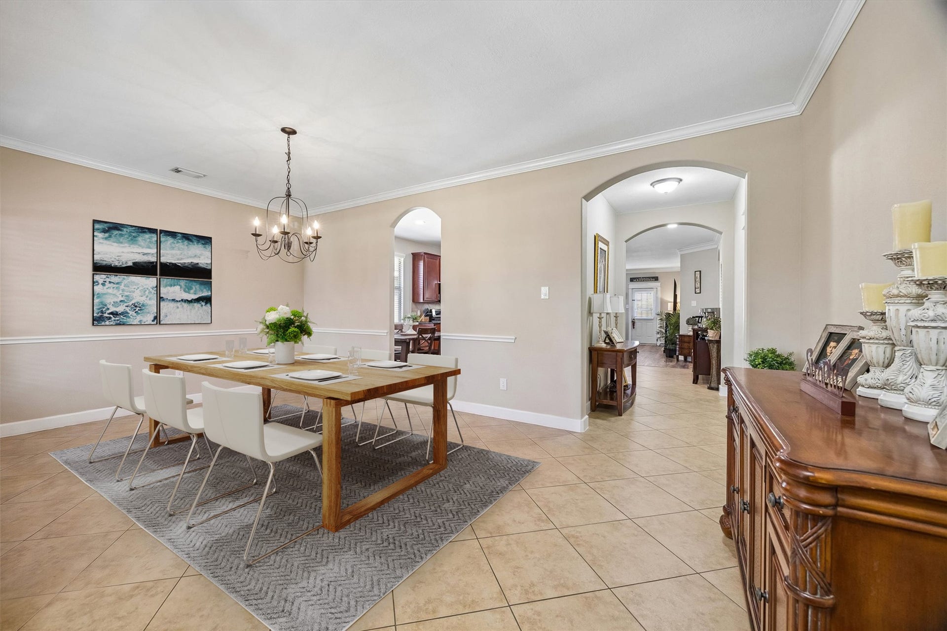 13918 Cypress Creek Bank Drive, Cypress, TX 77429 The formal dining room offers generous space for hosting family dinners and special occasions, with a beautiful chandelier and an open connection to the living area. Natural light and neutral finishes make the space feel warm and inviting.