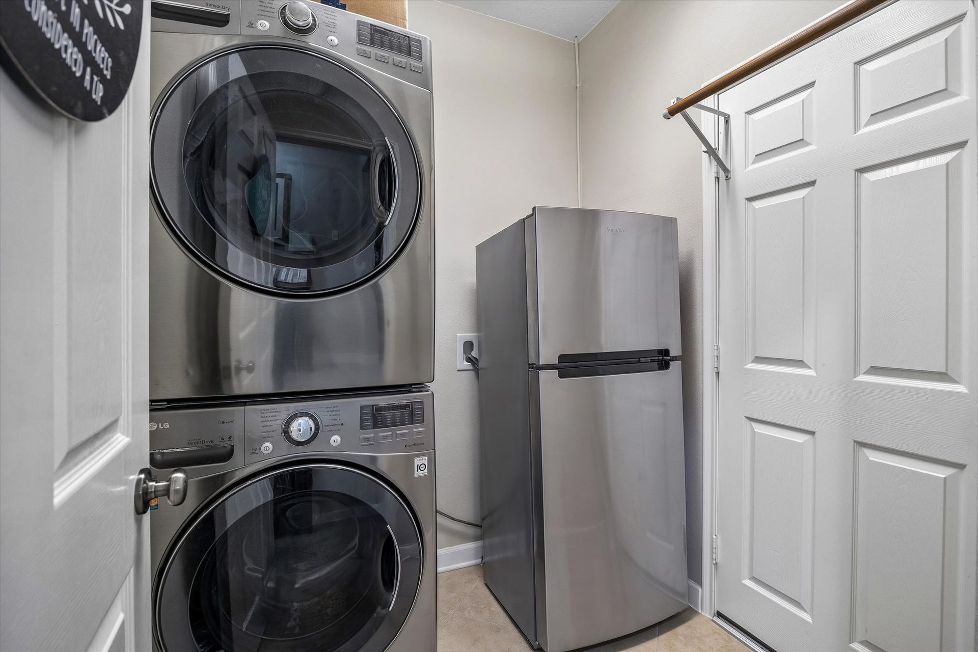 13918 Cypress Creek Bank Drive, Cypress, TX 77429 A dedicated utility room with space for a full-size washer and dryer makes laundry day a little easier. Additional storage keeps everyday essentials organized and out of sight.
