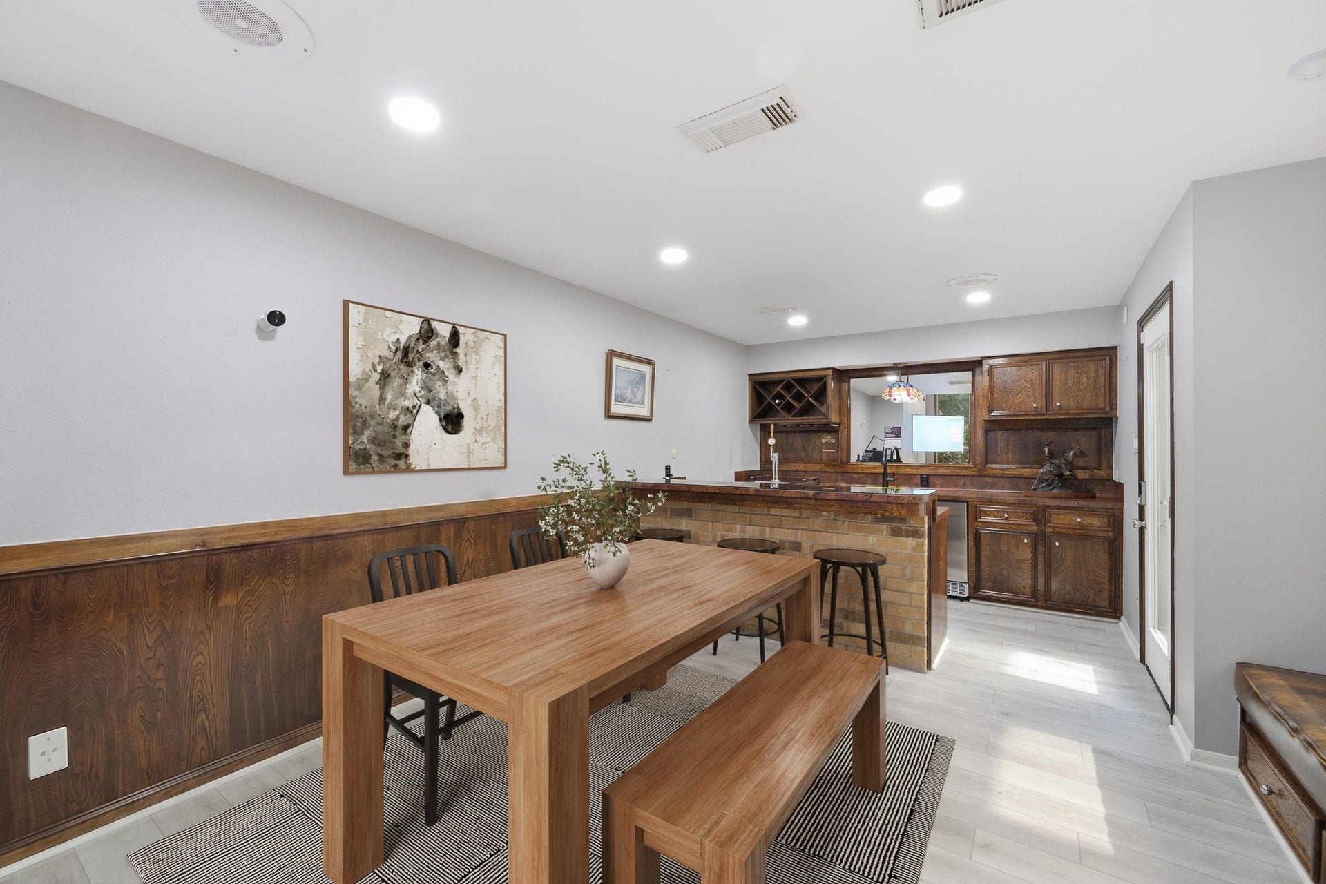 Great for entertaining, this home includes a bar and lounge area