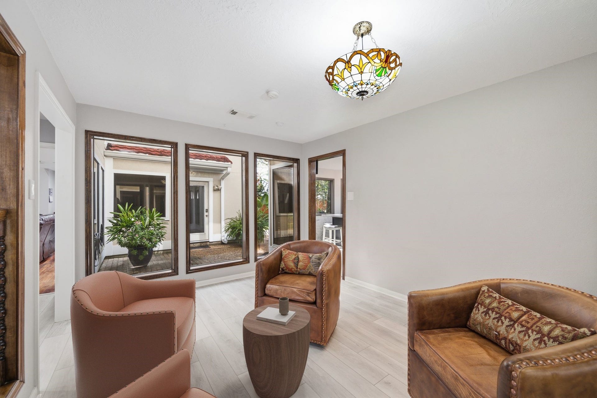The formal dining room is full of light and offers tons of options