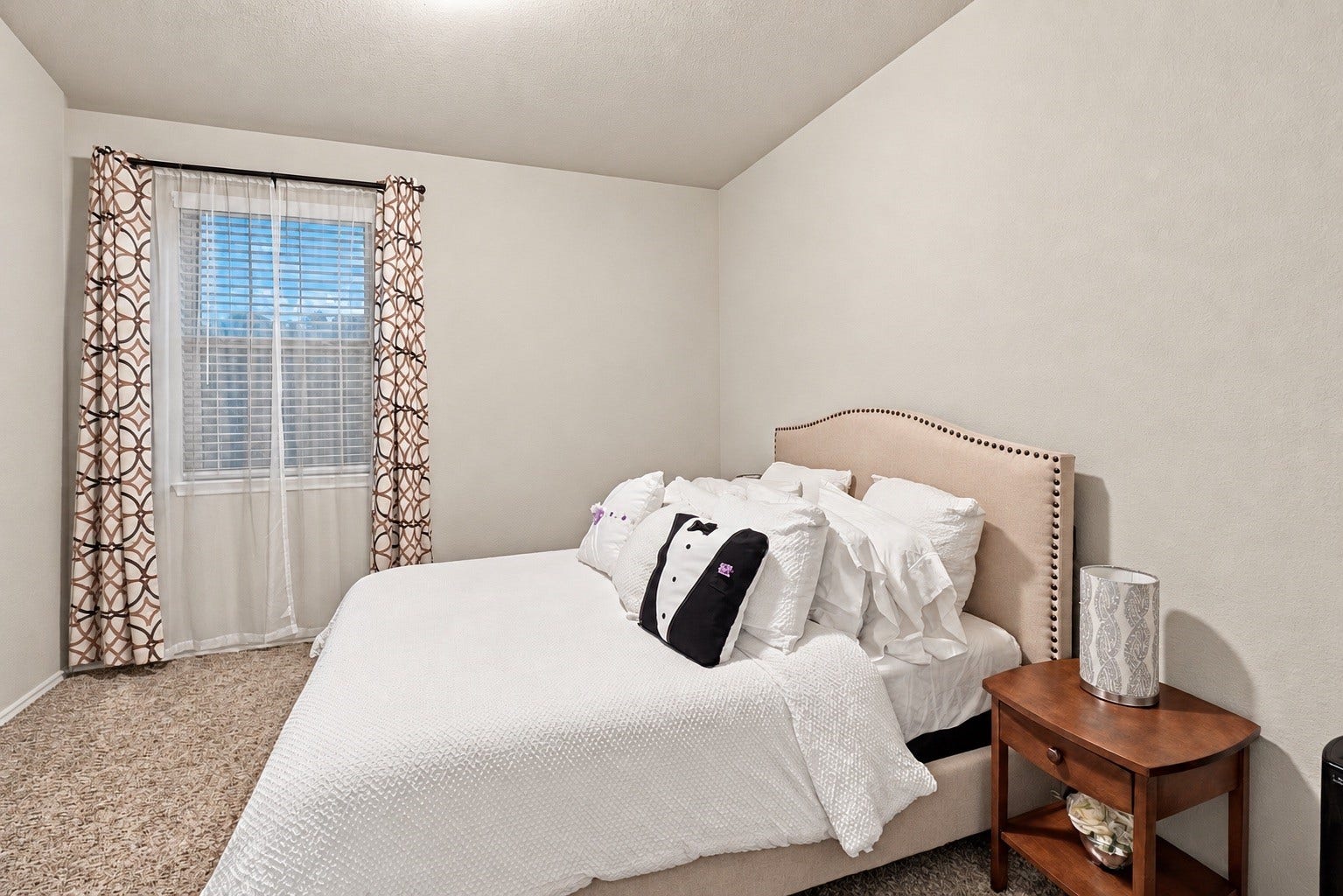 18042 Atwood Mill Drive, New Caney, TX 77357 Additional secondary bedroom with neutral finishes and natural lightideal for guests, an office, or flexible living space.