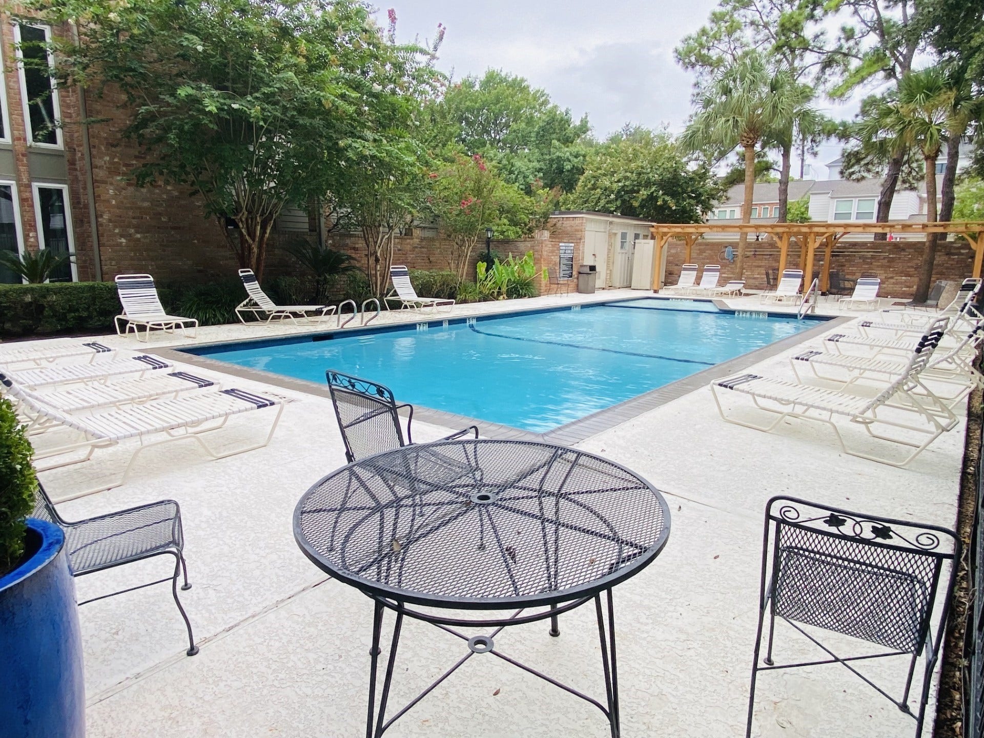 5904 Valley Forge Drive, #157, Houston, TX 77057 No better way to beat the Houston heat, than enjoying one of the multiple private pools in the pristine maintained Tanglegrove Community! Comfy chaise lOunge chairs, iron tables & chairs, pretty landscaping and the fresh new pergola - nice retreat from the heat! PLAY ALL DAY!