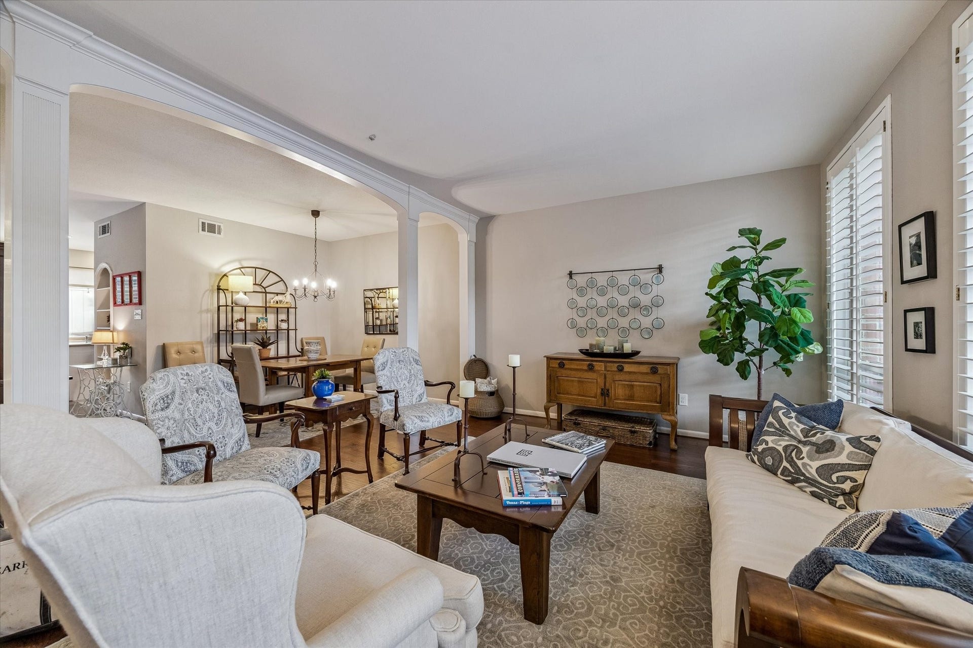5904 Valley Forge Drive, #157, Houston, TX 77057 You must see to appreciate the grand size and endless natural light created by the large floor to ceiling windows, and expanded open arched opening between the Dining Room and Living Room. Note there's an elegant Bar just out of this picture!