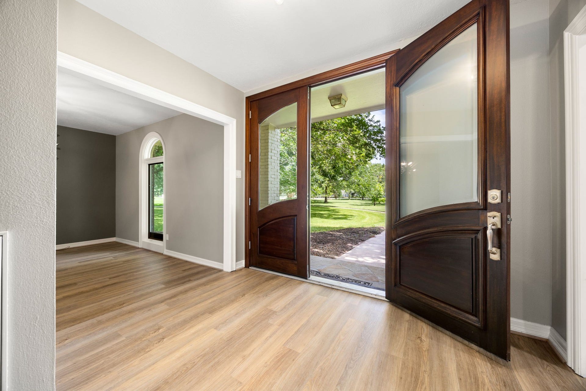 Welcoming foyer with formal entry and views into the heart of the home.