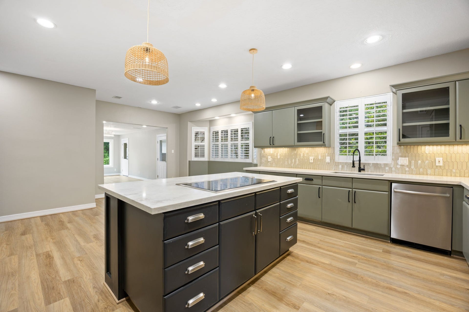 Spacious island kitchen with double ovens and generous prep space.