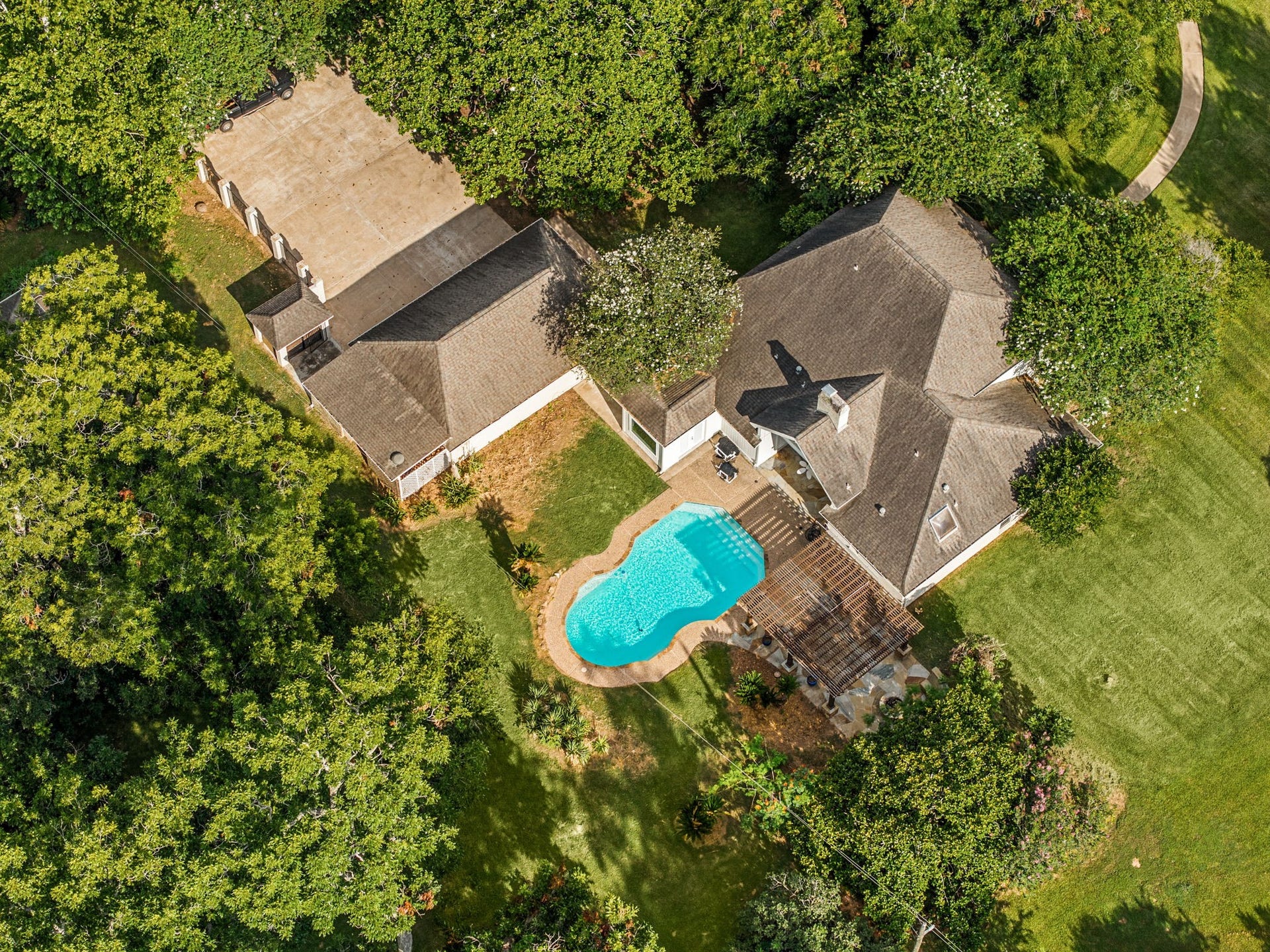 Aerial view showcasing the home's thoughtful layout and outdoor amenities.
