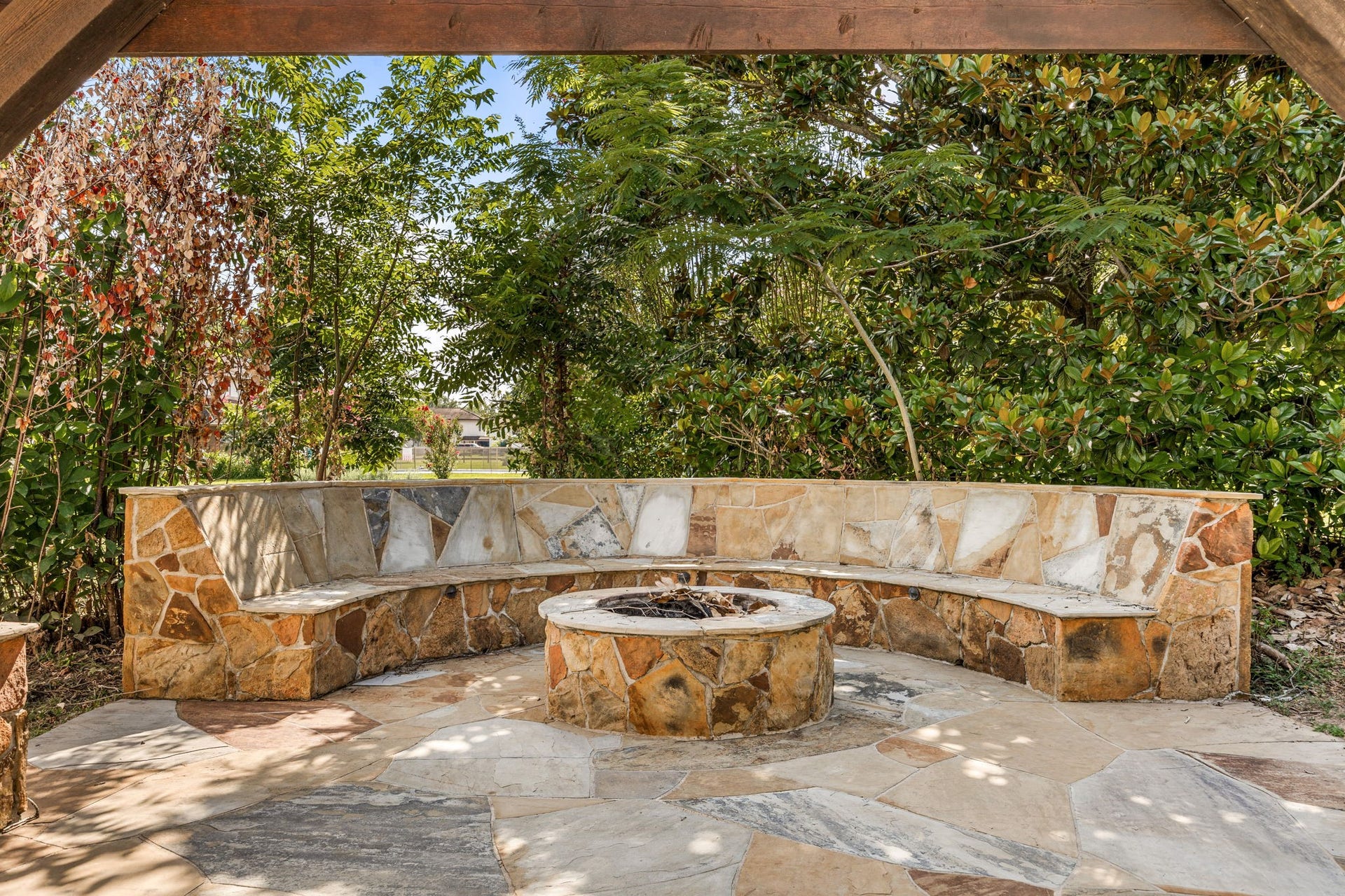 42. Outdoor fire pit and seating area designed for memorable gatherings.