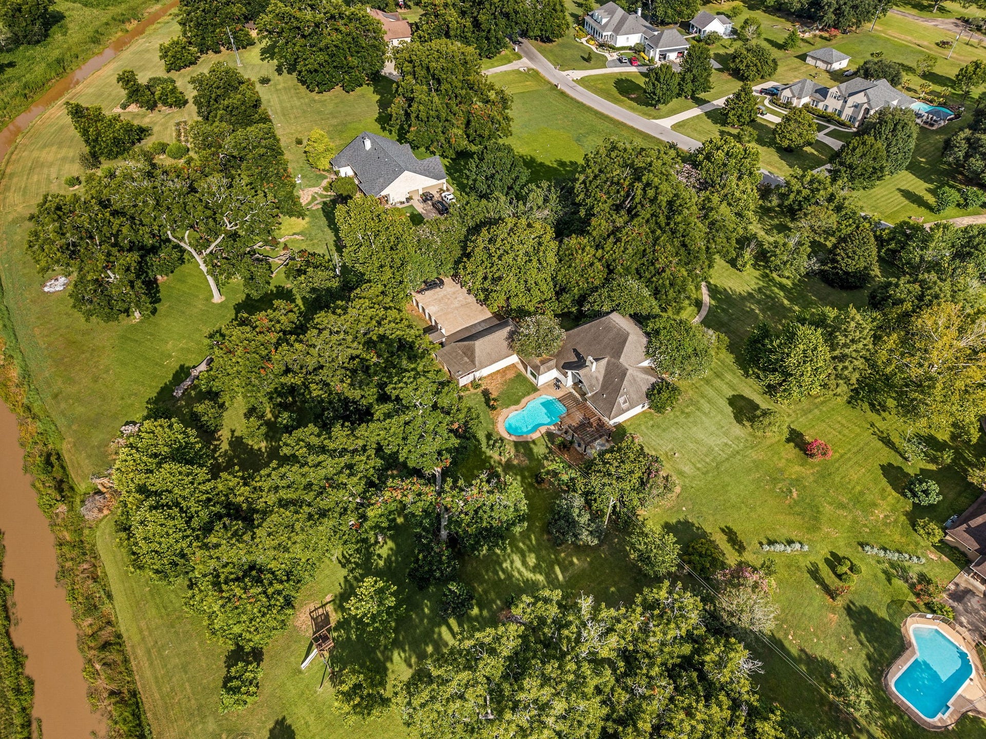 Rare Bella Vista estate offering exceptional privacy, acreage, a separate guest house, country living and timeless appeal. New A/C with 10-year warranty just installed.