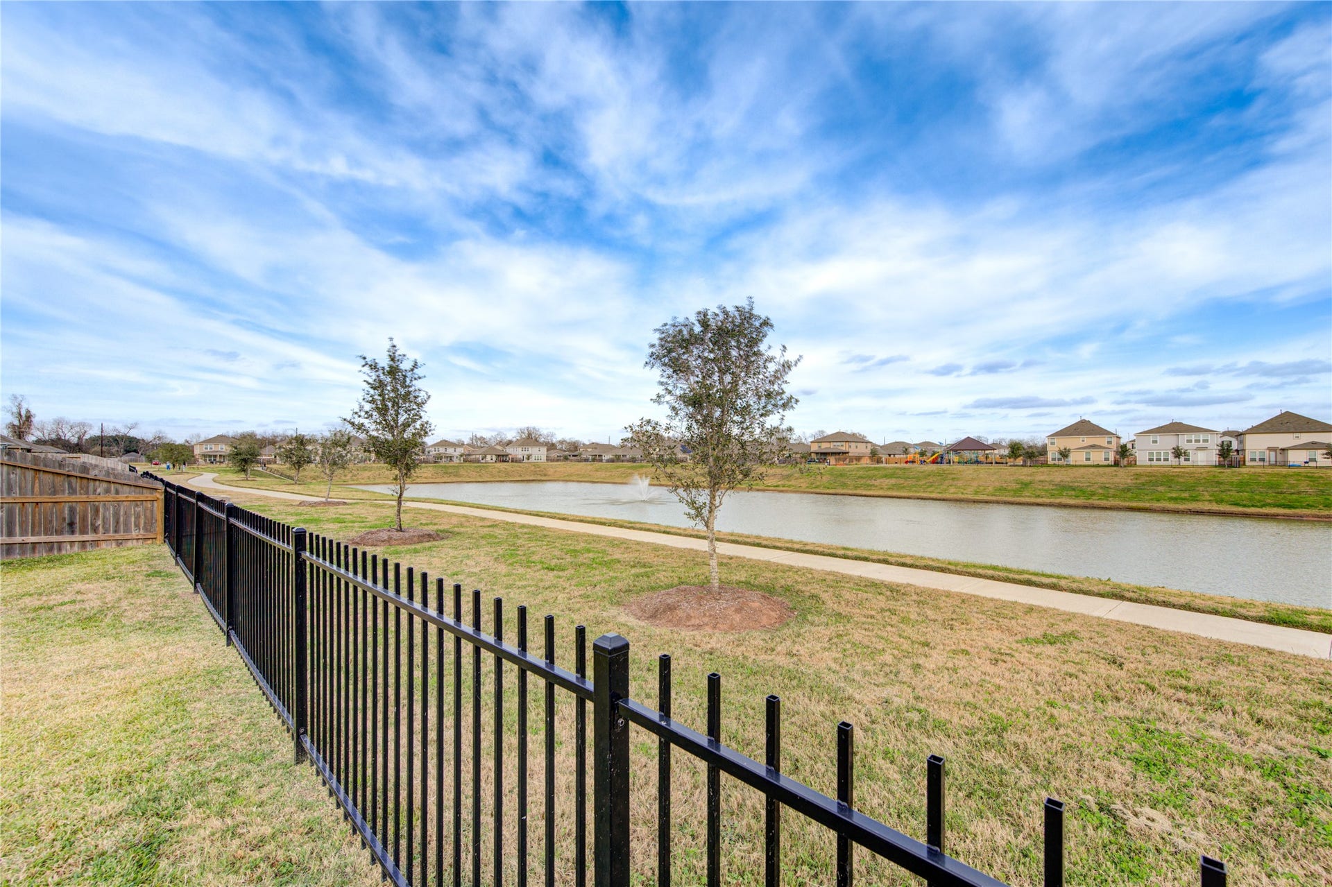 4922 Lucky Fawn Lane, Richmond, TX 77406 Take a walk along the lake.