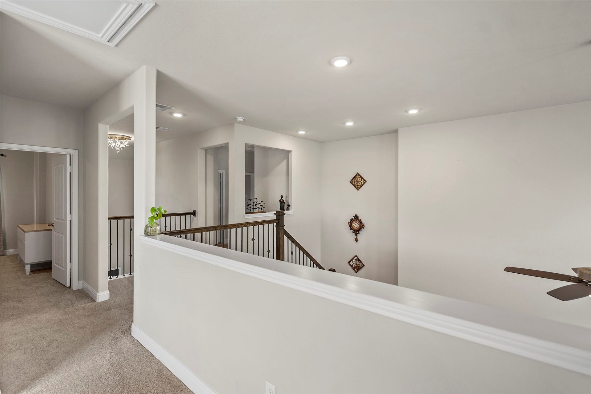 10810 Carolina Willow Court, Cypress, TX 77433 Open upstairs landing with views into the main living space.