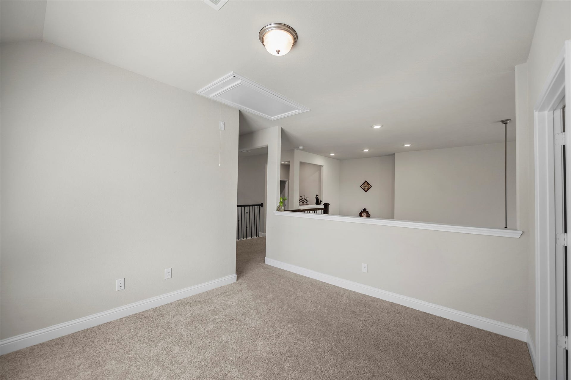 10810 Carolina Willow Court, Cypress, TX 77433 Upstairs game room offering flexible space for relaxing or entertaining.