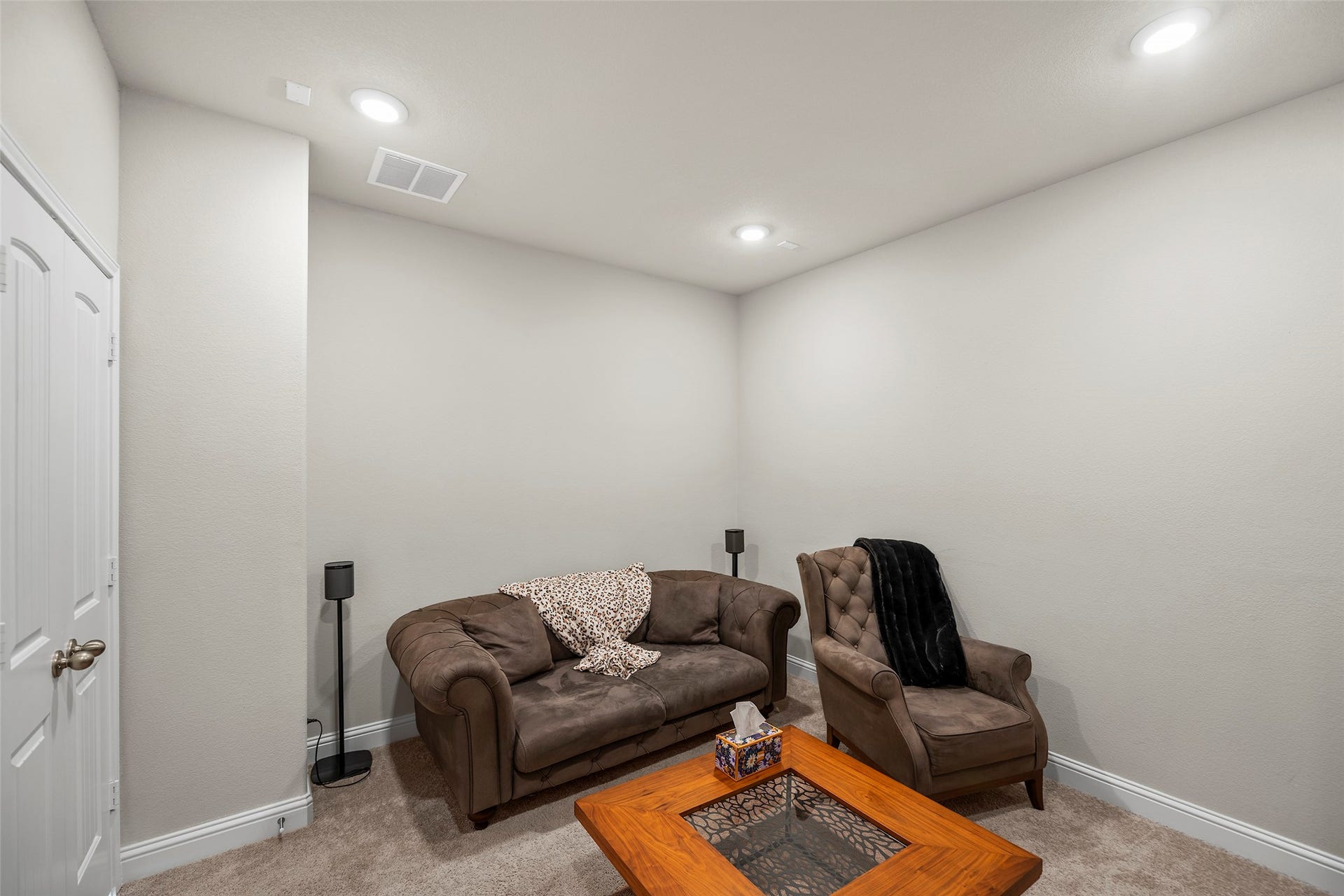 10810 Carolina Willow Court, Cypress, TX 77433 Versatile upstairs media room ideal for movie nights or additional gathering space.