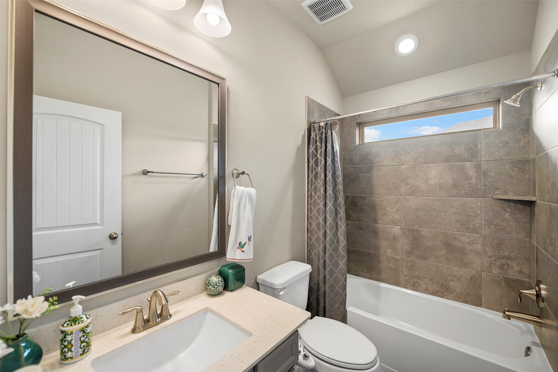 10810 Carolina Willow Court, Cypress, TX 77433 Full bathroom with a tub and shower combination.