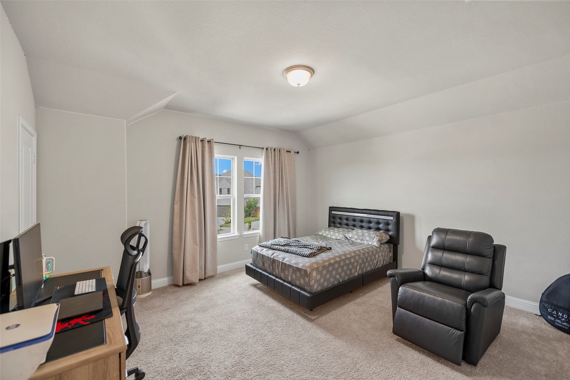 10810 Carolina Willow Court, Cypress, TX 77433 Spacious bedroom offering plenty of room for a flexible layout.