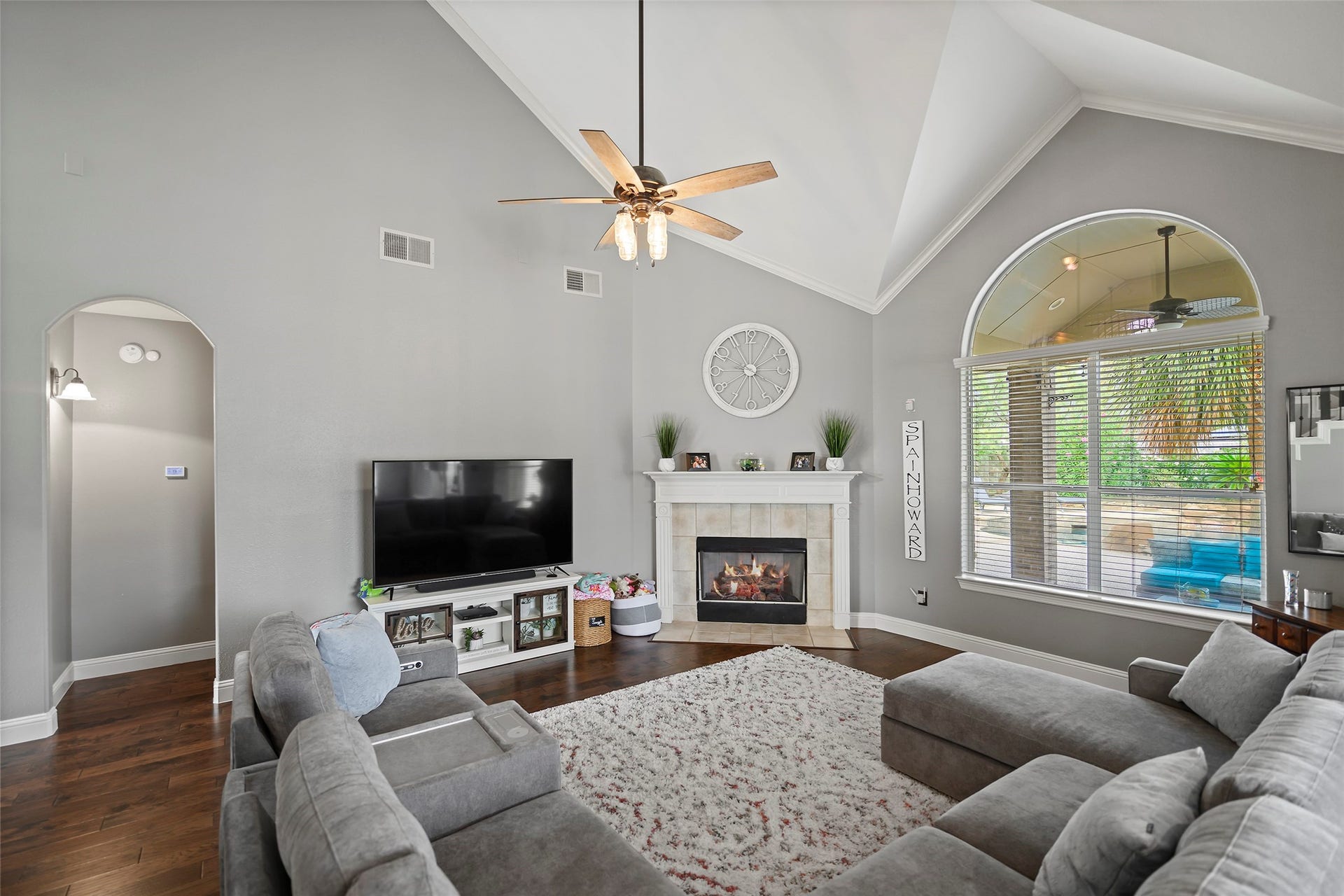17415 Old Court Drive, Tomball, TX 77377 Family Room showing entrance to Primary Suite and Covered Patio