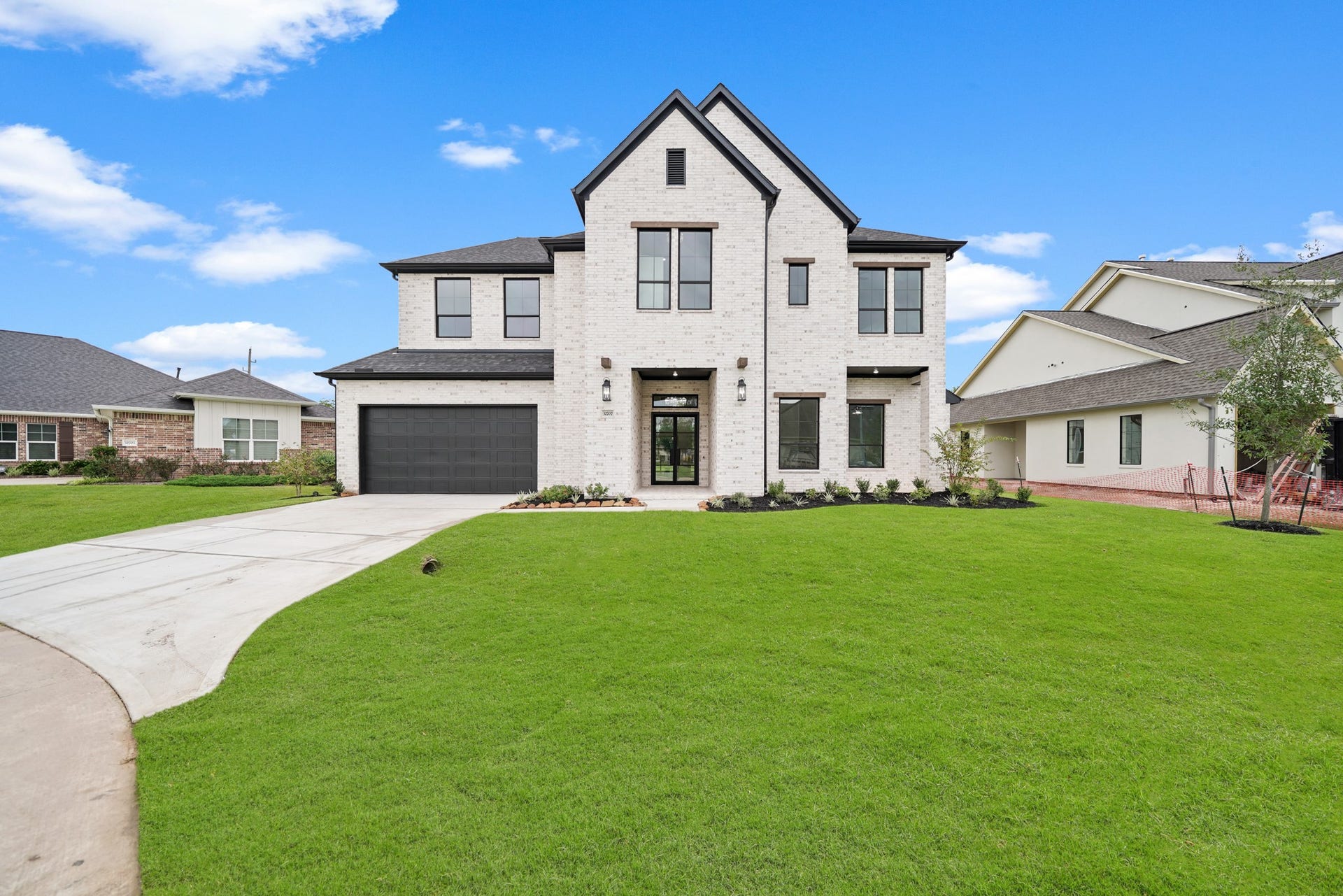 Perimeter fence has been installed. Welcome home! Home awaits you with one of the most impressive elevations you will see in this community. Impossible to miss it as soon as you turn onto its street, it will put a smile in your face every time you return.