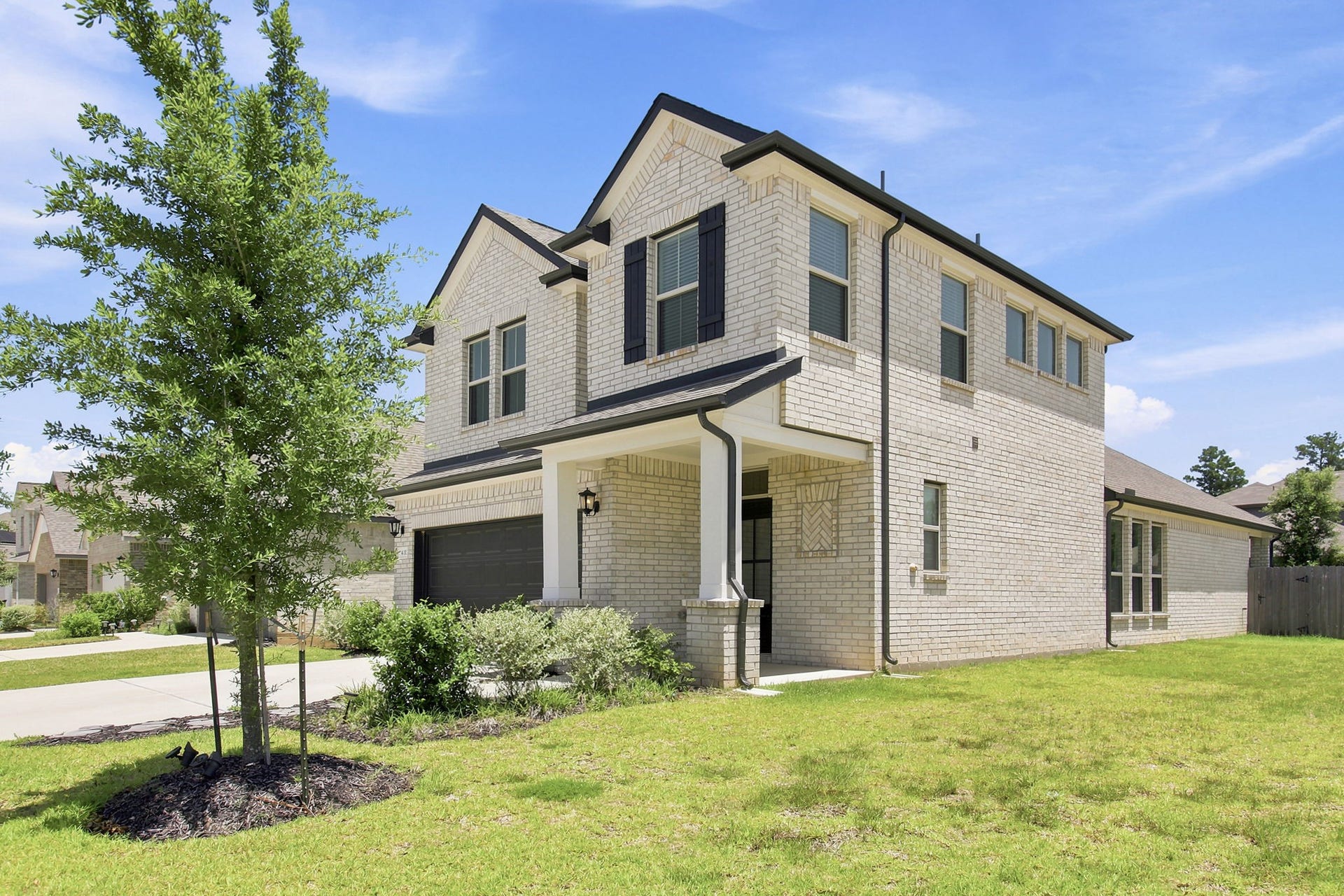 402 Alex Arbor Way Way, Conroe, TX 77301 Corner view of home