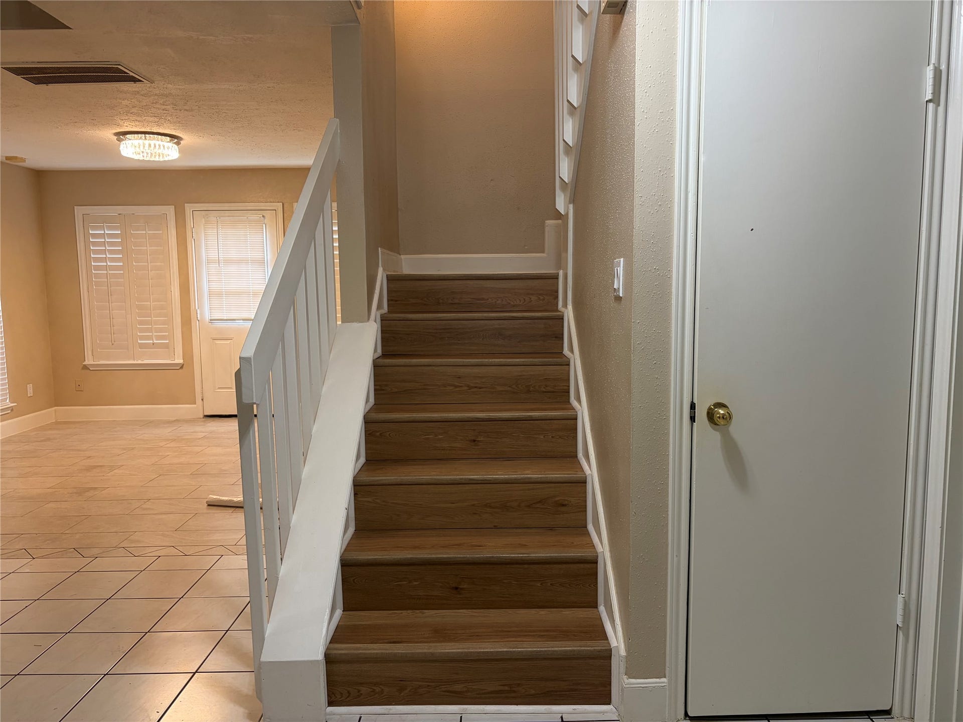 3510 Greenwood Dr Drive, Sugar Land, TX 77478 Stairs lead to the upstairs game room, two bedrooms plus a full bath.