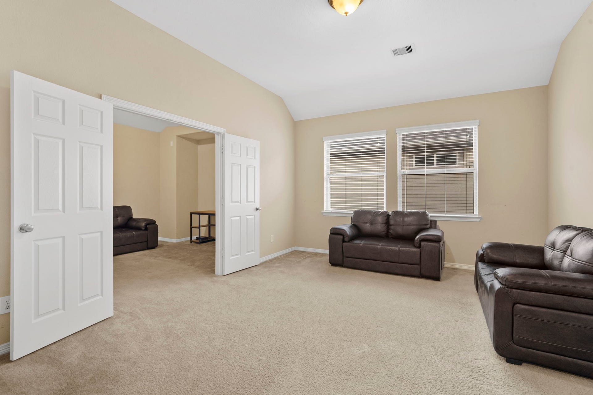 5515 Mangrove Creek Lane, Sugar Land, TX 77479 Second-floor game room featuring double doors that open to a separate media room.