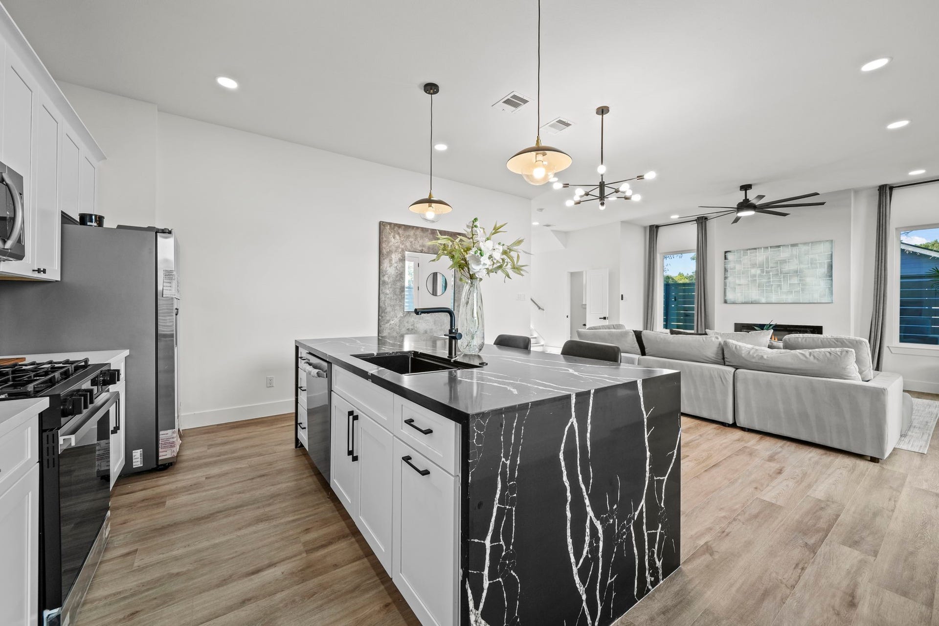 The island offers more cabinet space and a stainless steel dishwasher.