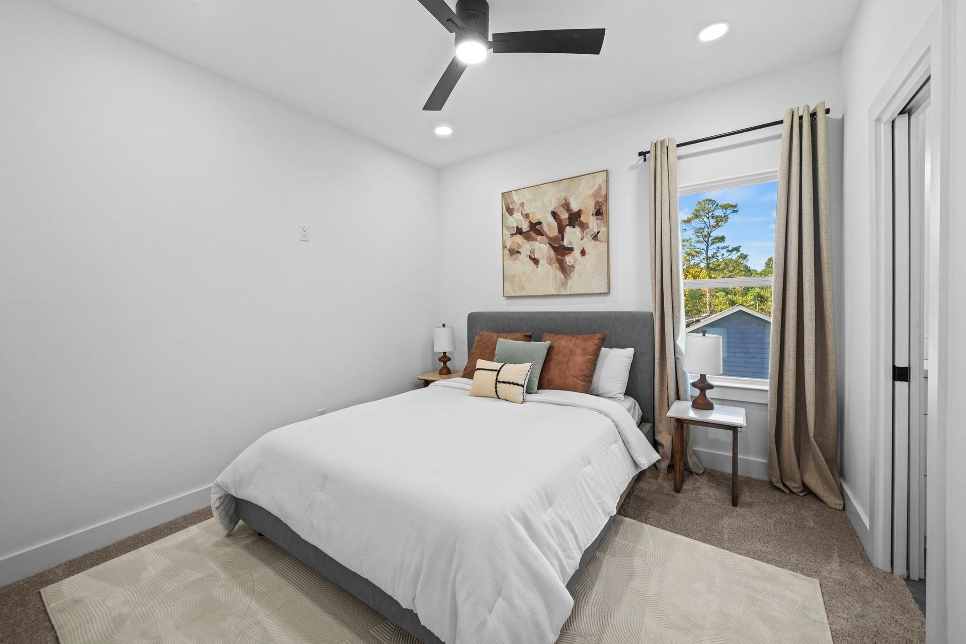 One of two secondary bedrooms on the second floor.