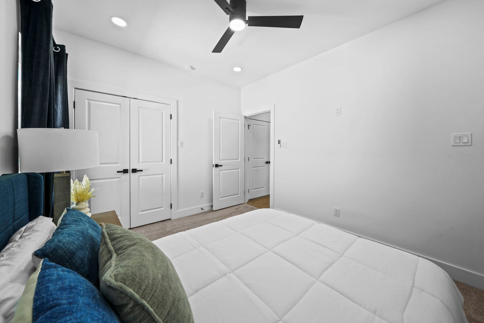 This bedroom also has french doors leading to the closet.