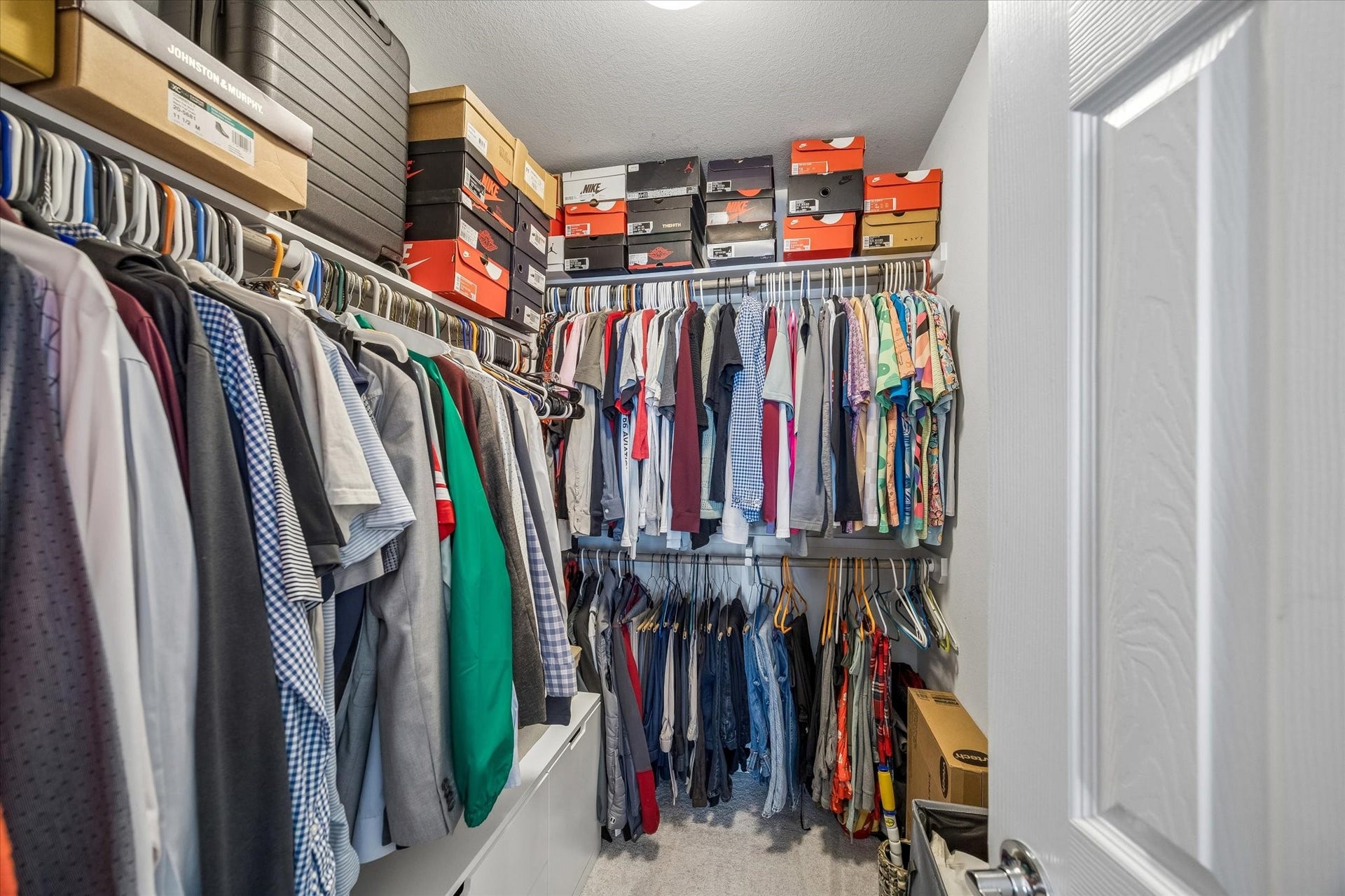 One of two generously sized walk-in closets in the primary bedroom.