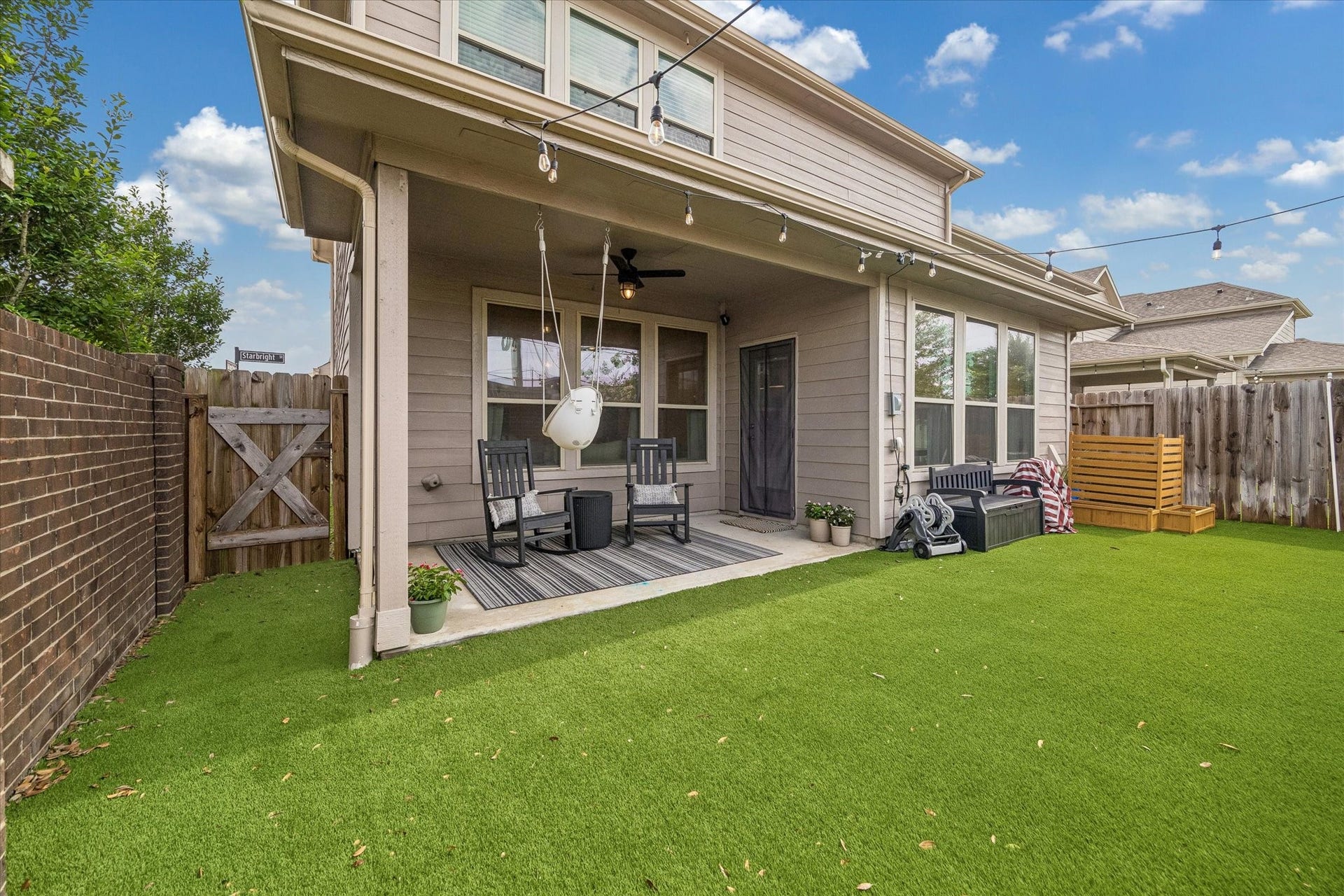 Expansive turf yard with plenty of room for play equipment, outdoor games, and gatherings.