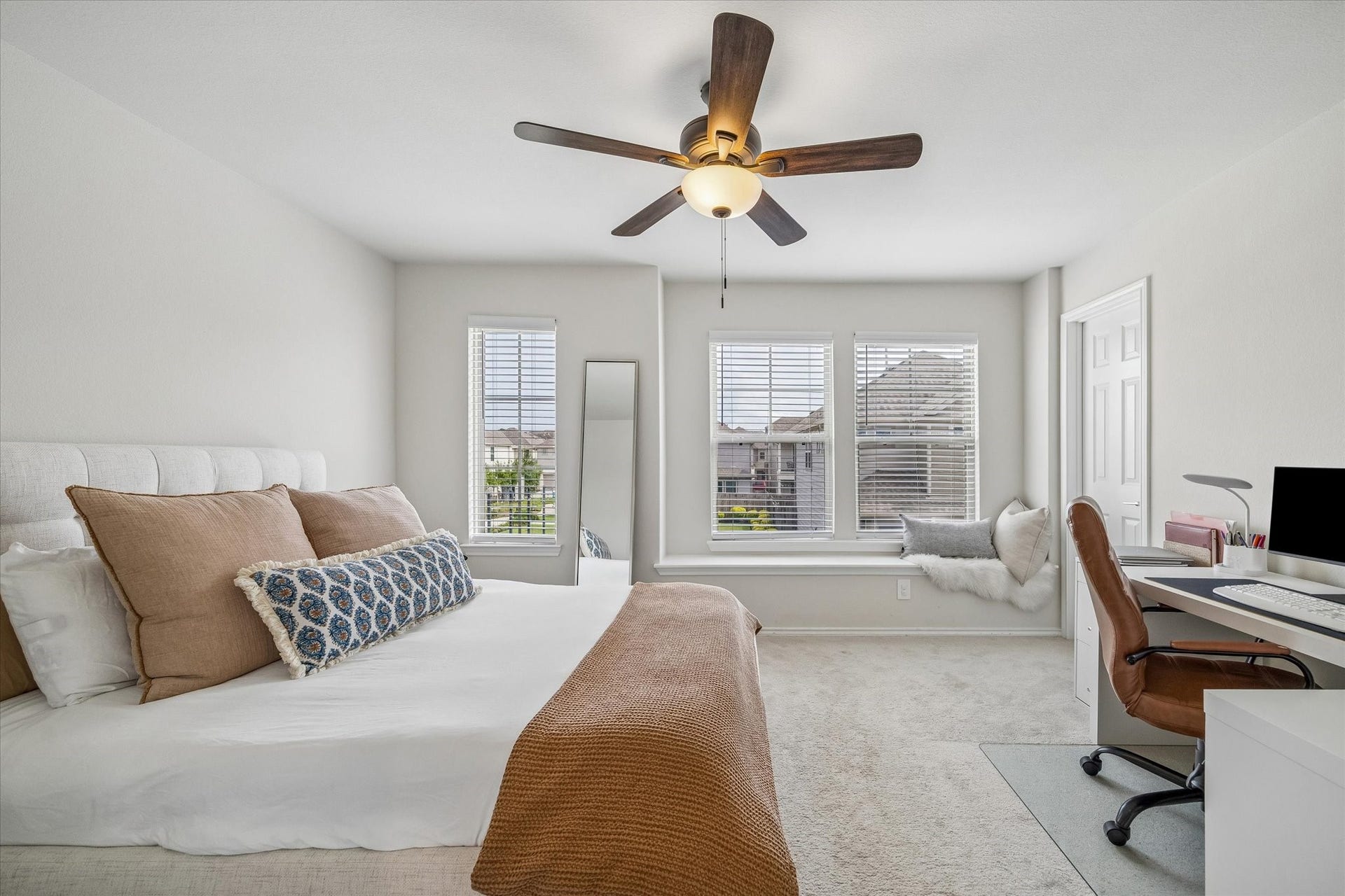 Another secondary bedroom with abundant natural light.