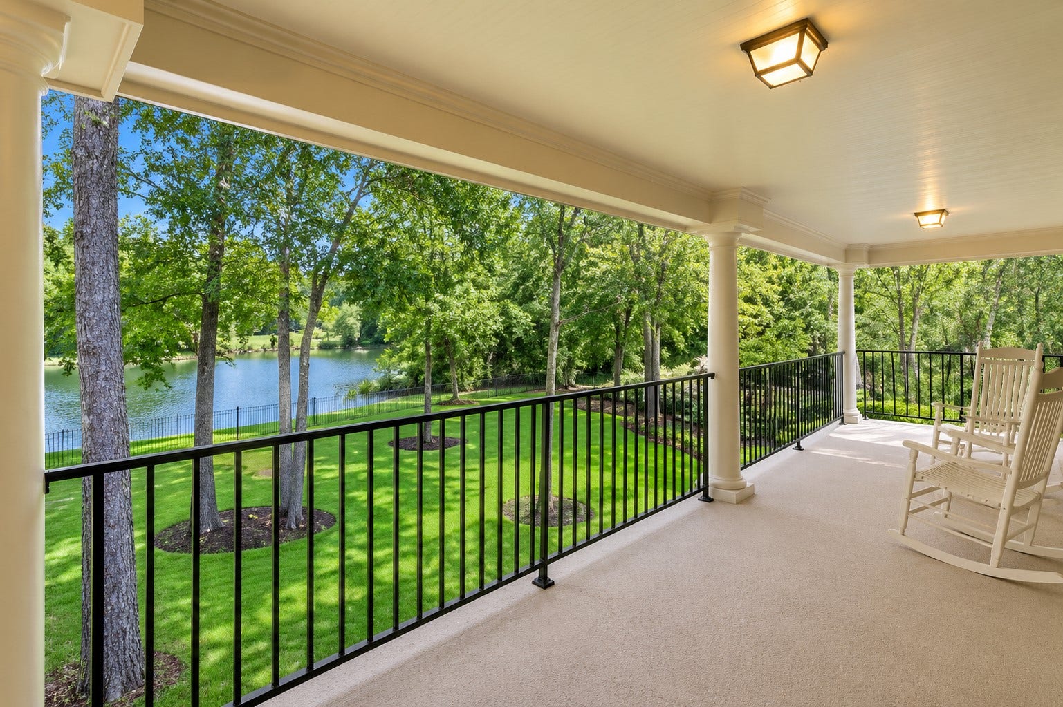 7 Pastoral Pond Circle, The Woodlands, TX 77380 Upper balcony with scenic views of the pond and park-like backyard; conveniently located adjacent to the game room and upstairs bedroom.