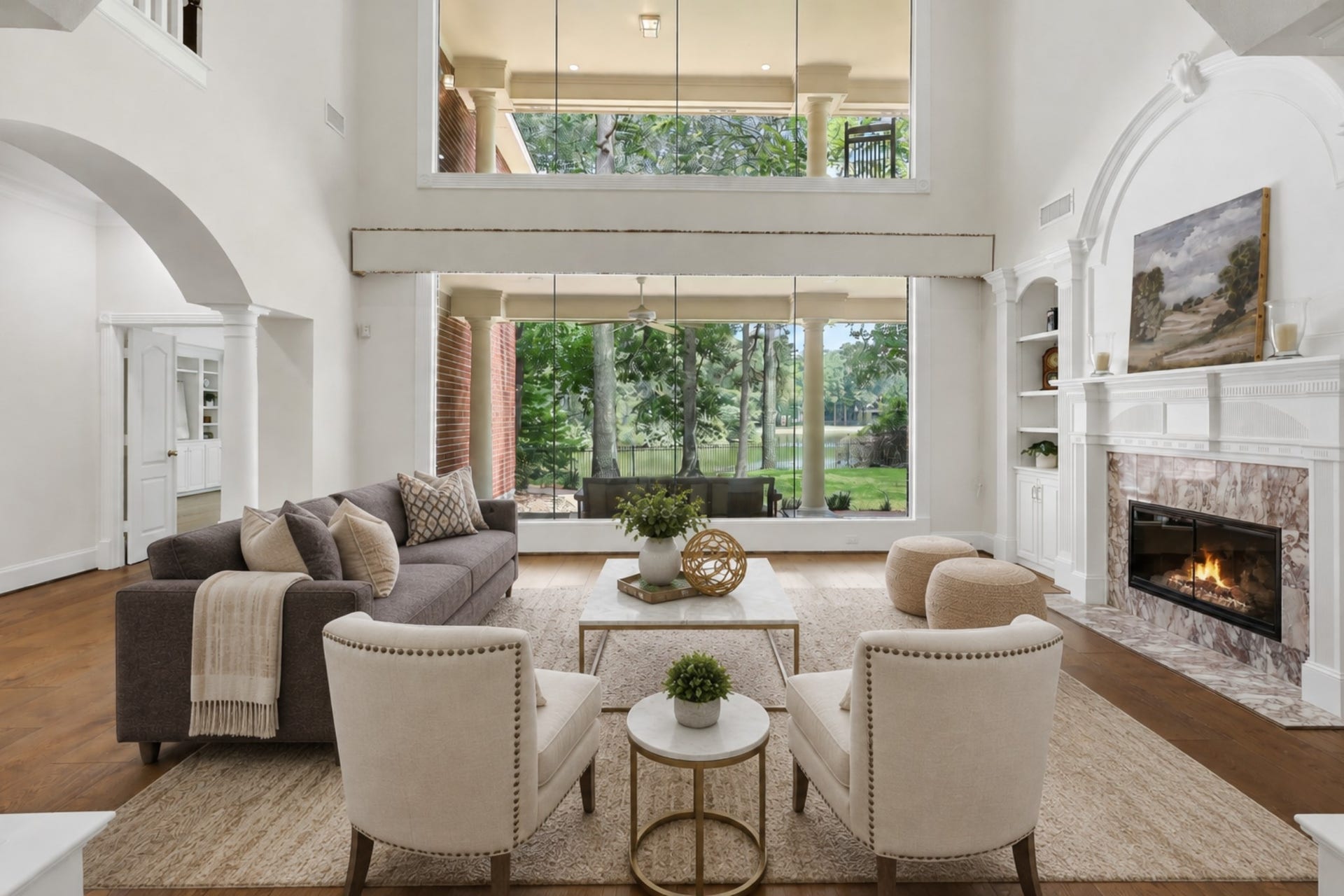 7 Pastoral Pond Circle, The Woodlands, TX 77380 Virtually staged Living Room with lovely views of the pond