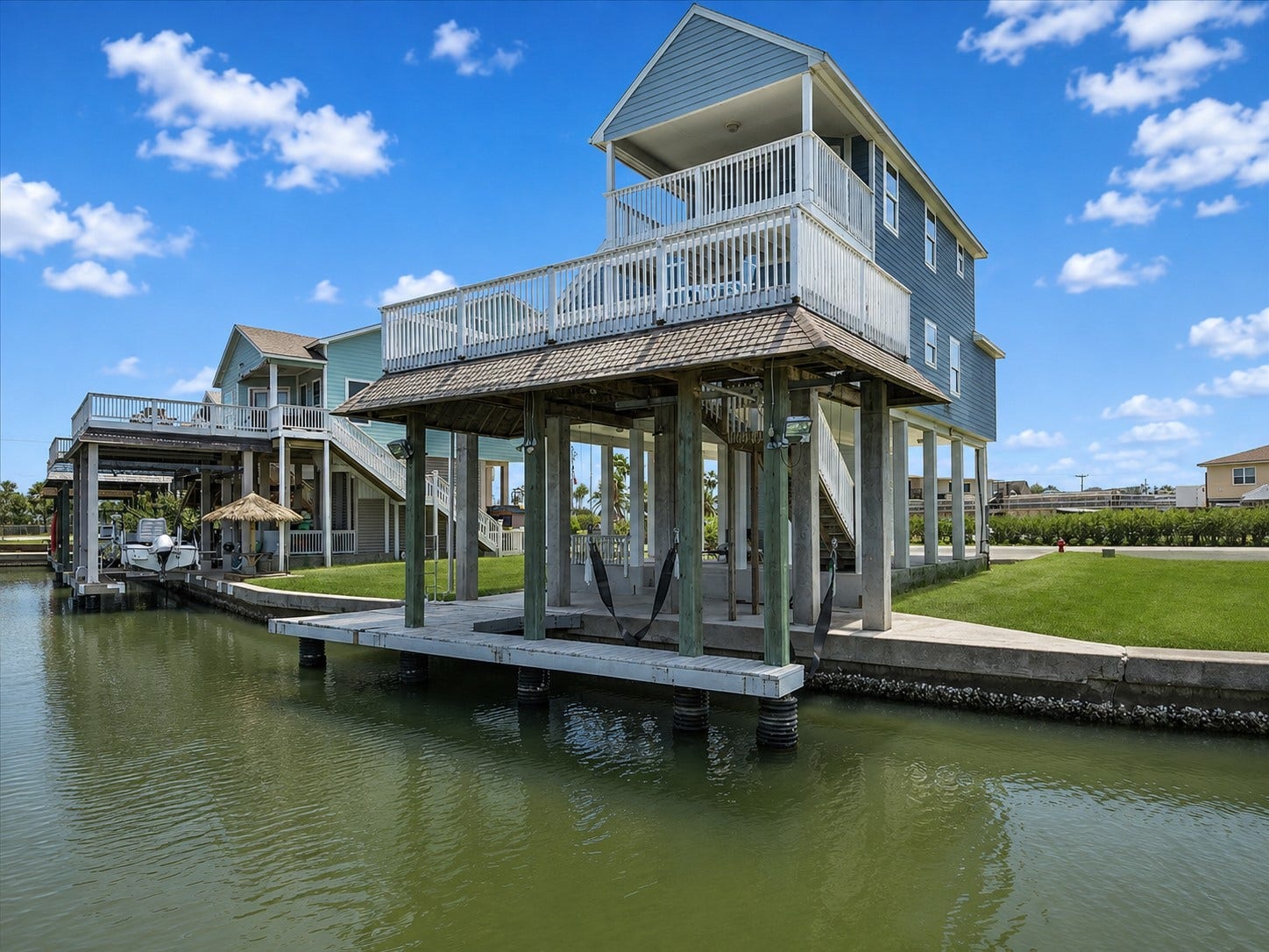 314 Windward Way, Tiki Island, TX 77554 Experience elevated waterfront living in Tiki Island! This immaculately maintained coastal retreat welcomes you